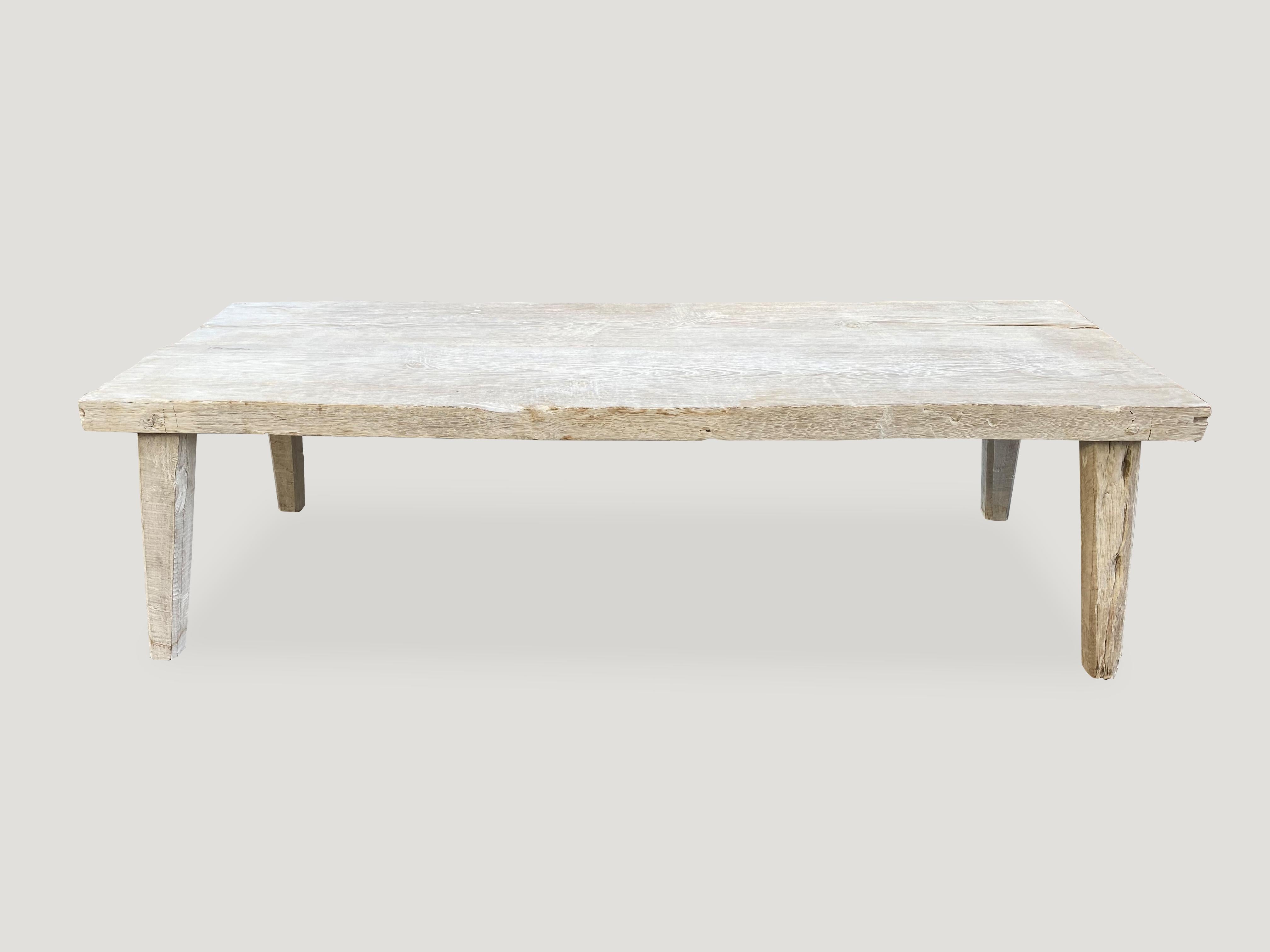 Beautiful Minimalist bench or coffee table, bleached with a light white wash finish. The top is made from a single two inch thick reclaimed teak panel.

The St. Barts collection features an exciting new line of organic white wash, bleached and