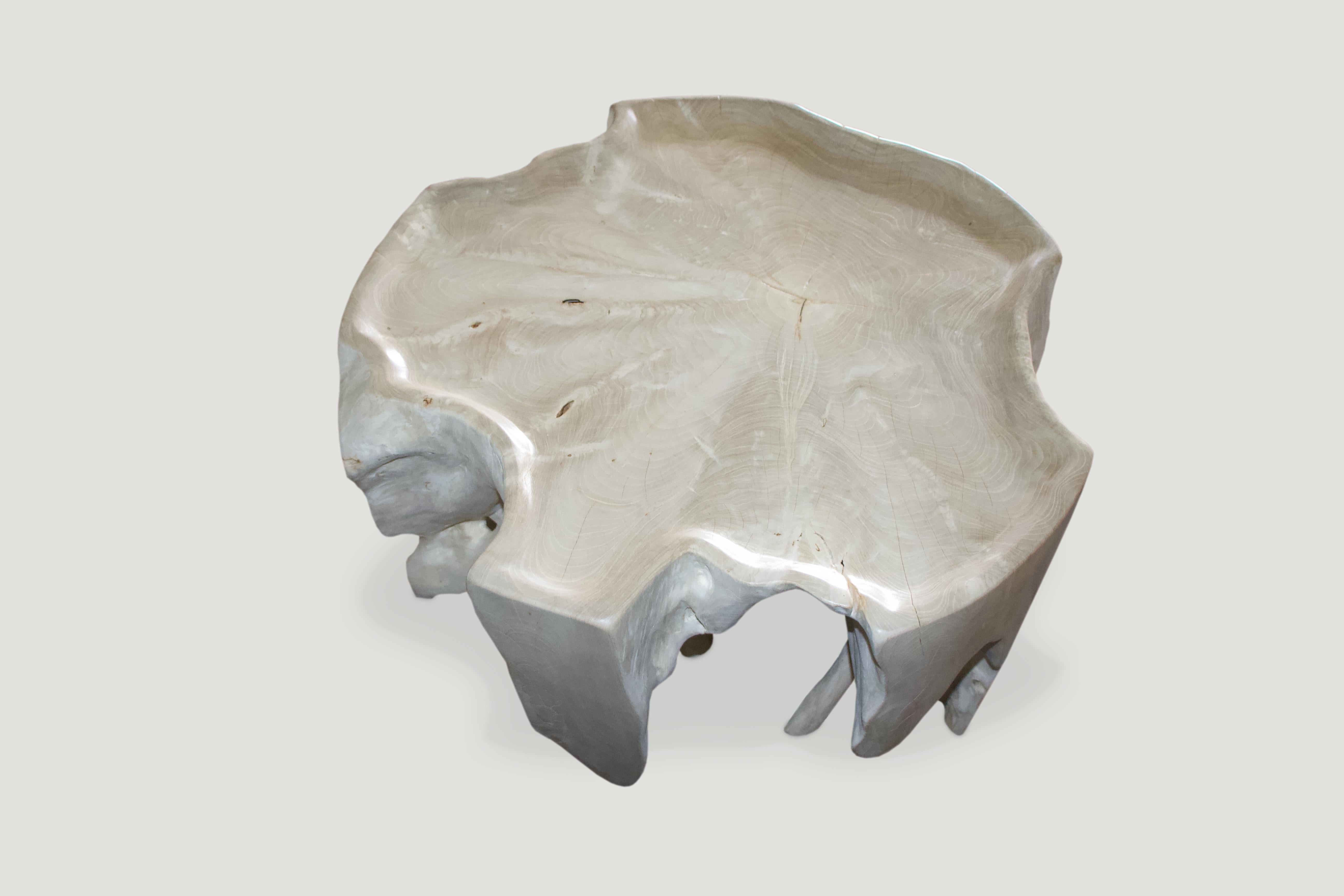 Natural organic formed reclaimed teak root coffee table. We hand carved the top section into a tray style and added a light shellack for this stunning bone finish. Organic is the new modern.

The St. Barts collection features an exciting new line