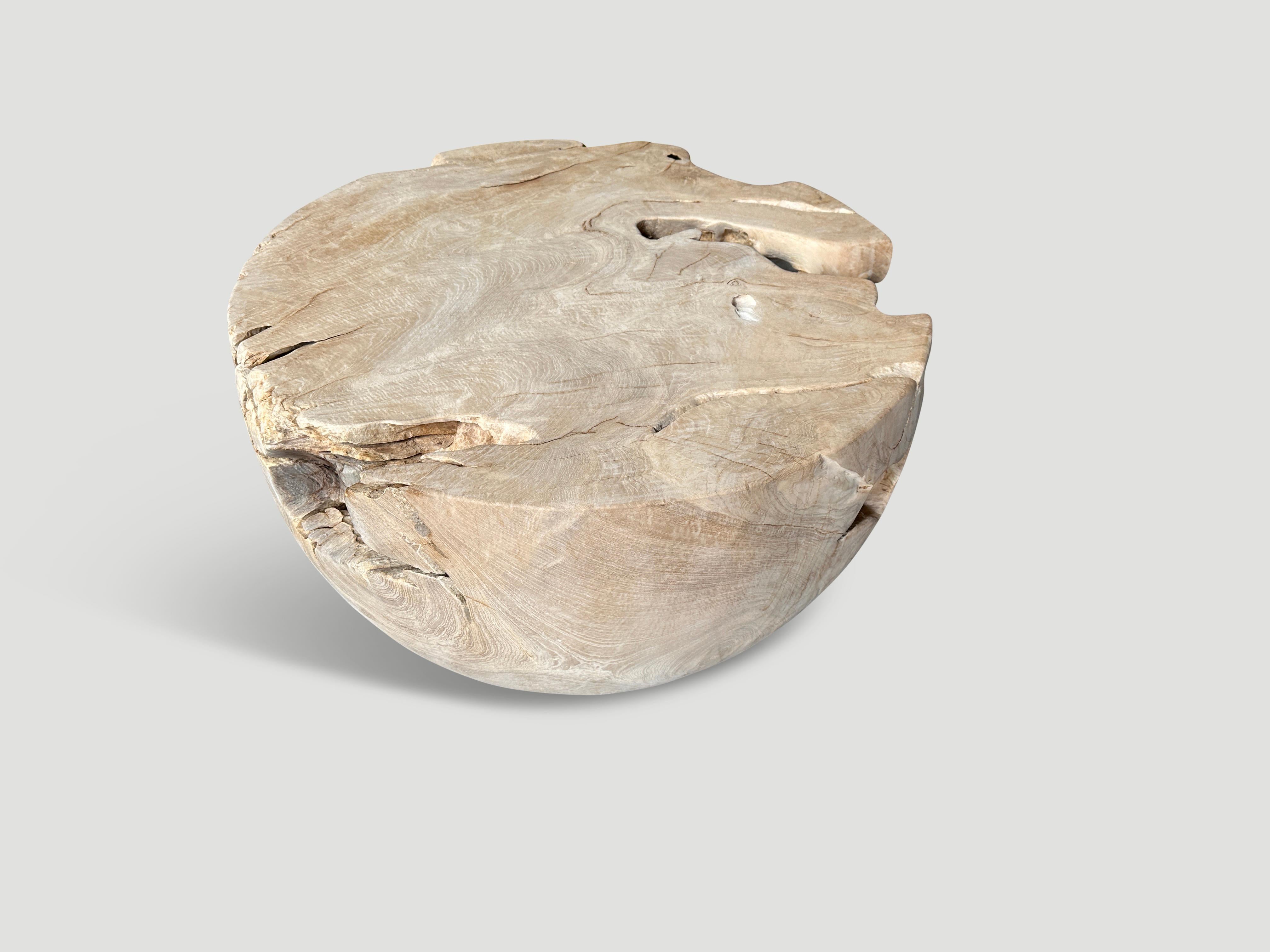 Reclaimed teak root coffee table hand carved into a drum shape whilst respecting the natural organic wood. We added a light white wash revealing the beautiful wood grain.

The St. Barts Collection features an exciting line of organic white wash,