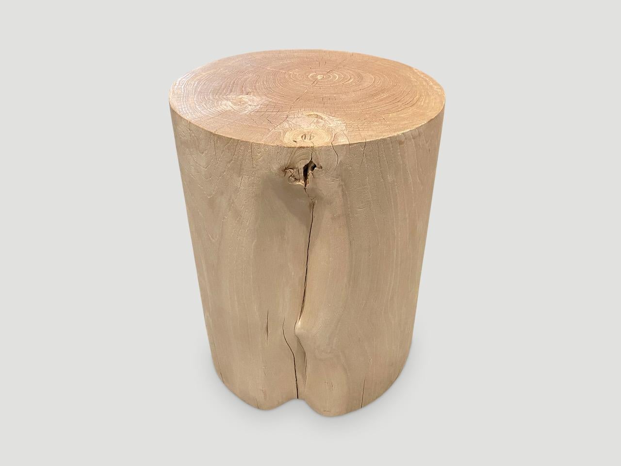 Reclaimed teak wood cylinder side table or stool. Bleached to a bone finish and hand carved into a minimalist cylinder whilst respecting the natural organic wood. Also available charred. Please inquire. We have a collection.

The St. Barts