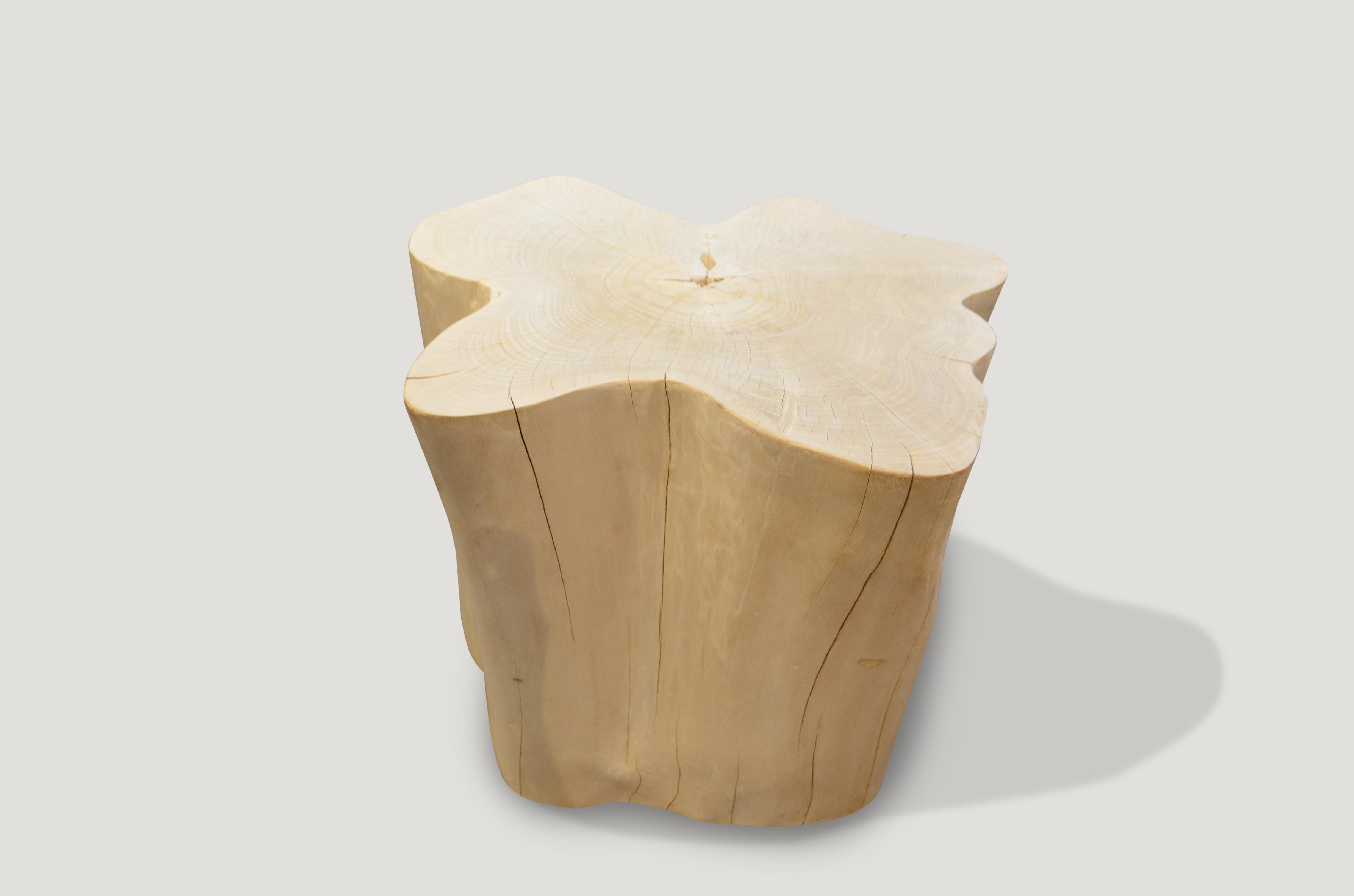 Reclaimed bleached teak wood amorphous side table. A slight graduation from the bottom to the top. 

The St. Barts collection features an exciting new line of organic white wash and natural weathered teak furniture. The reclaimed teak is left to