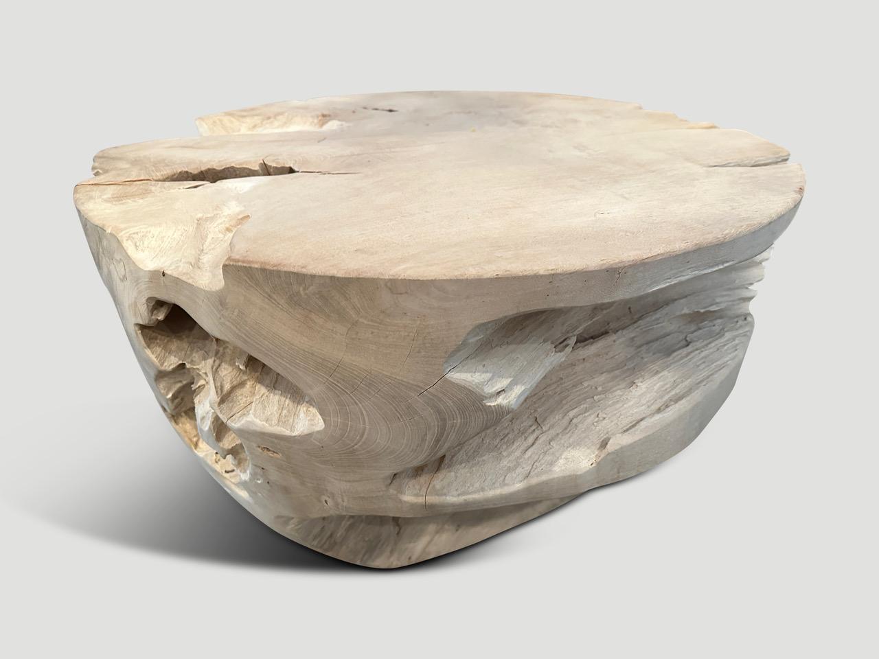 Reclaimed teak root coffee table hand carved into a drum shape whilst respecting the natural organic wood. We added a light white wash revealing the beautiful wood grain. Both usable and sculptural. 

The St. Barts Collection features an exciting