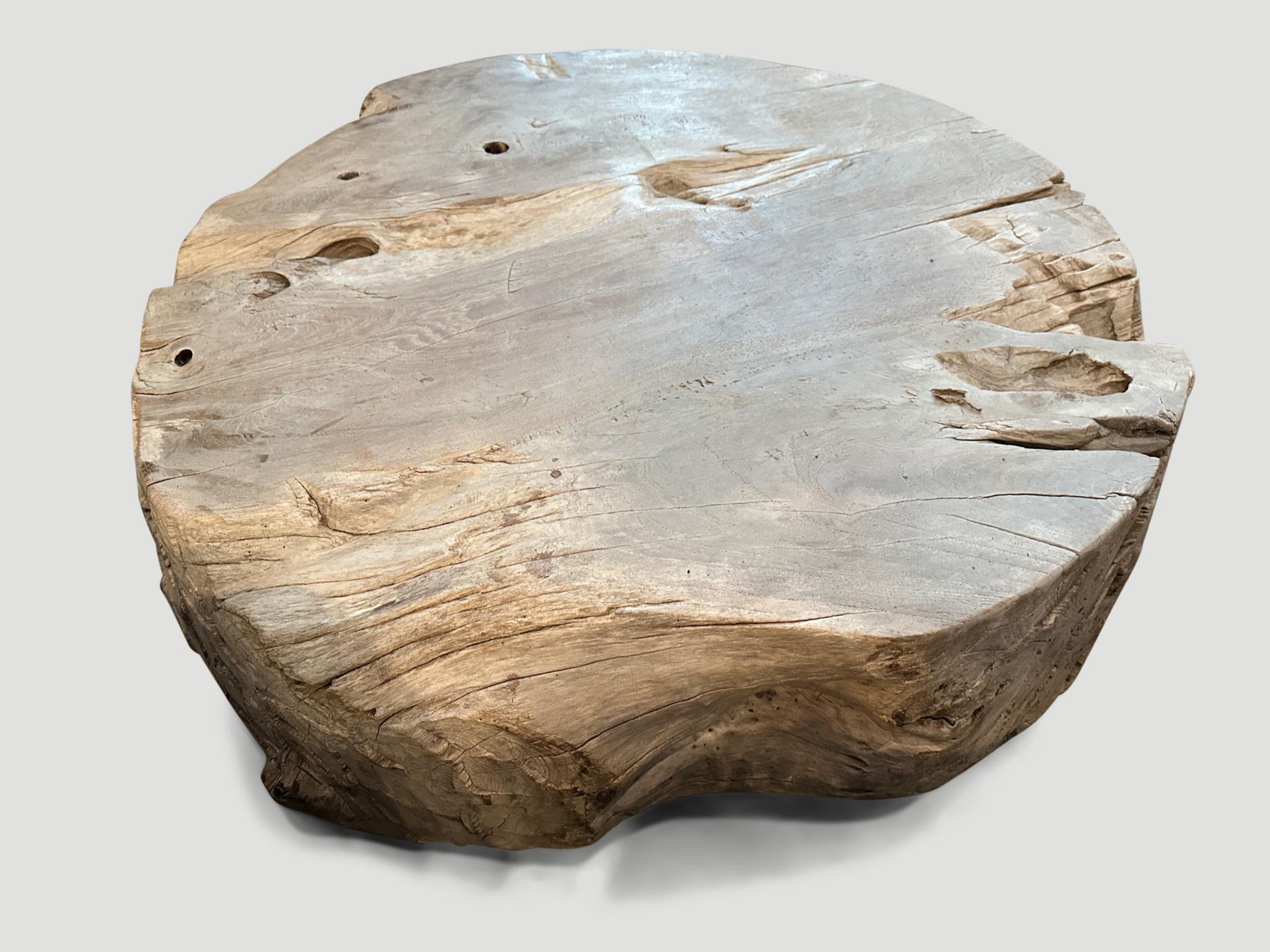Beautiful patina on this aged teak wood round coffee table. Hand carved whilst respecting the natural organic wood.

This coffee table was hand made in the spirit of Wabi-Sabi, a Japanese philosophy that beauty can be found in imperfection and