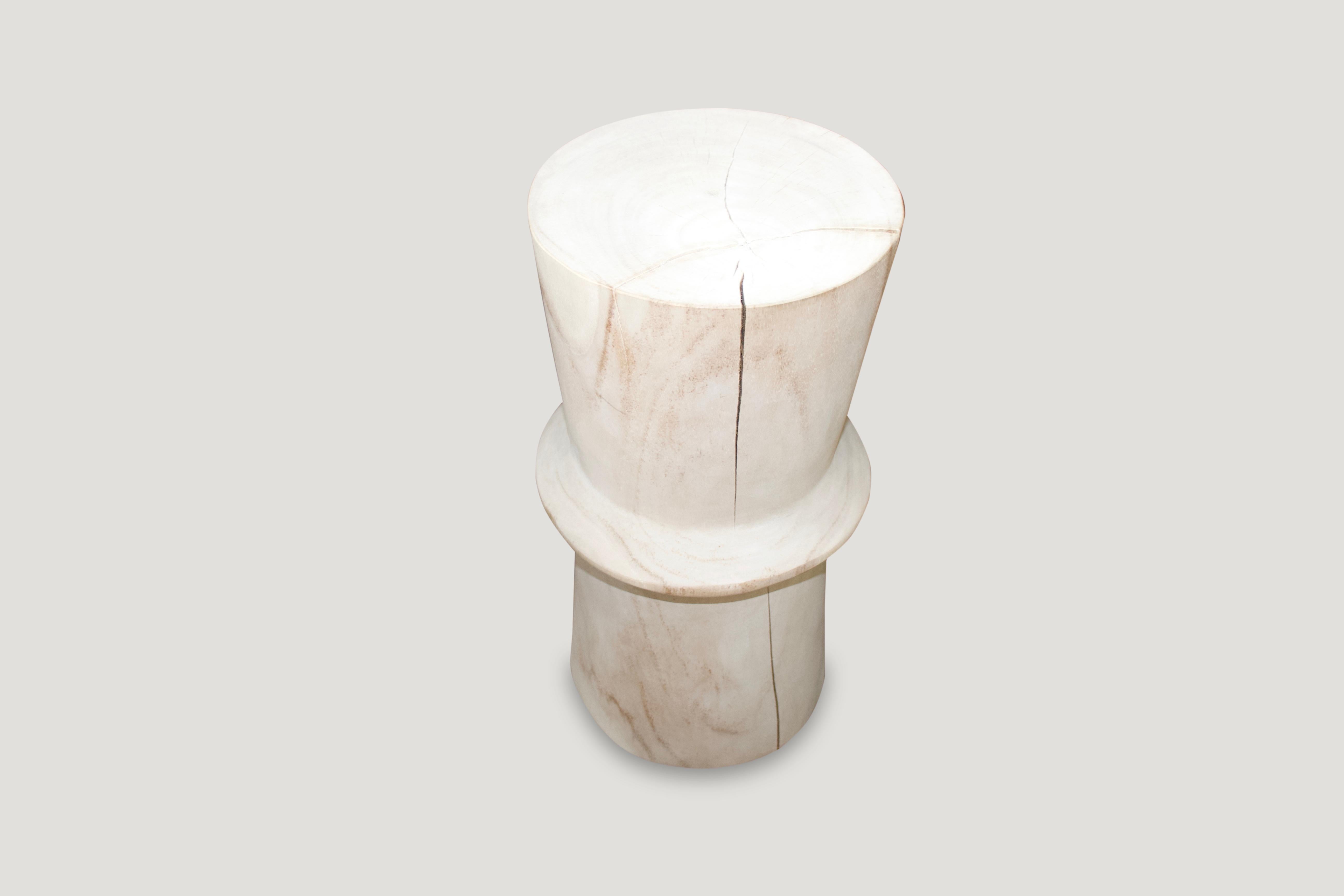 Hand carved, reclaimed teak wood side table or stool. The price reflects one.

The St. Barts Collection features an exciting new line of organic white wash and natural weathered teak furniture. The reclaimed teak is bleached and left to bake in the