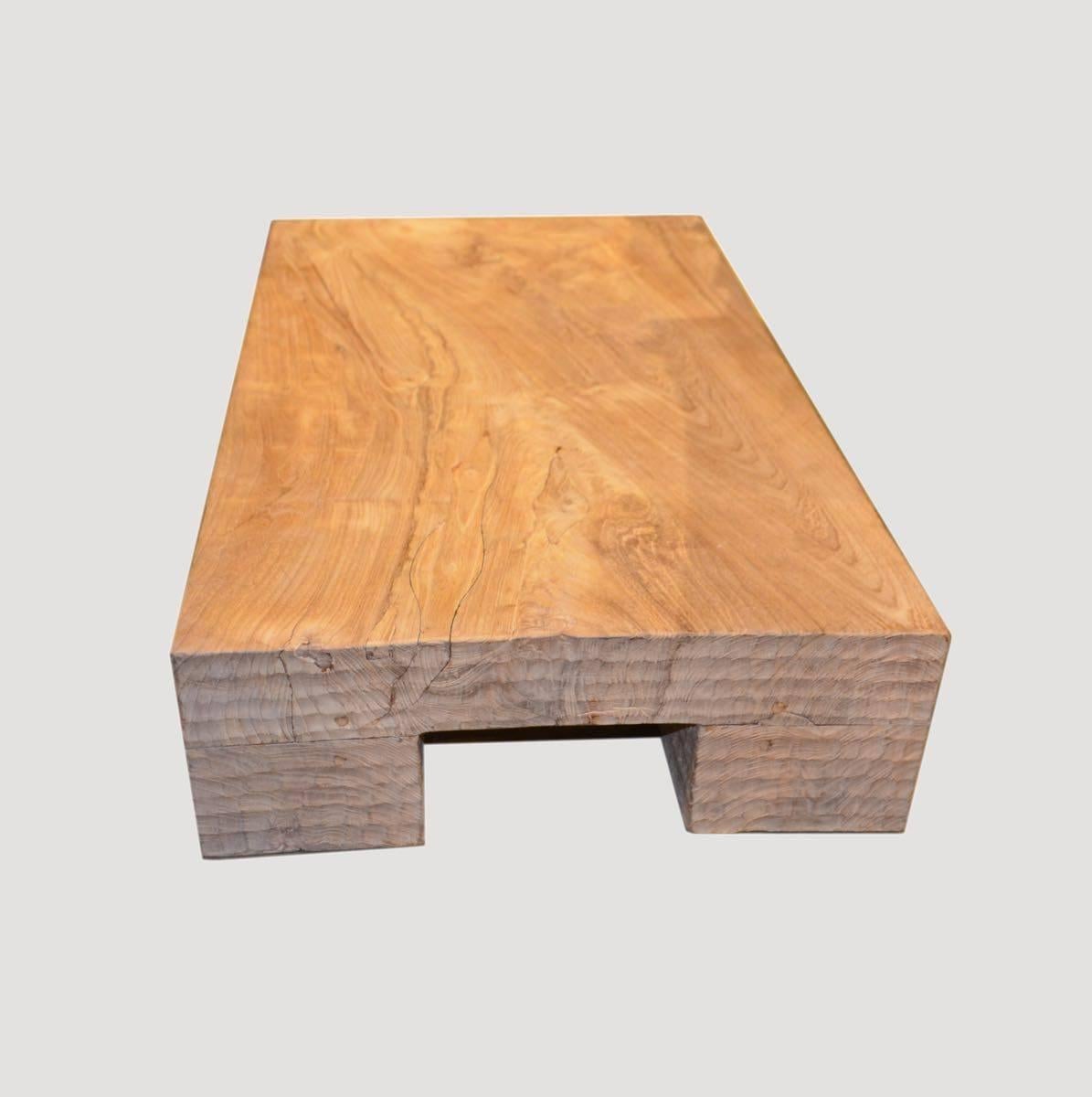 Minimalist single reclaimed teak slab low coffee table. Carved block legs. Custom stains available.

This coffee table was sourced in the spirit of wabi-sabi, a Japanese philosophy that beauty can be found in imperfection and impermanence. It’s a
