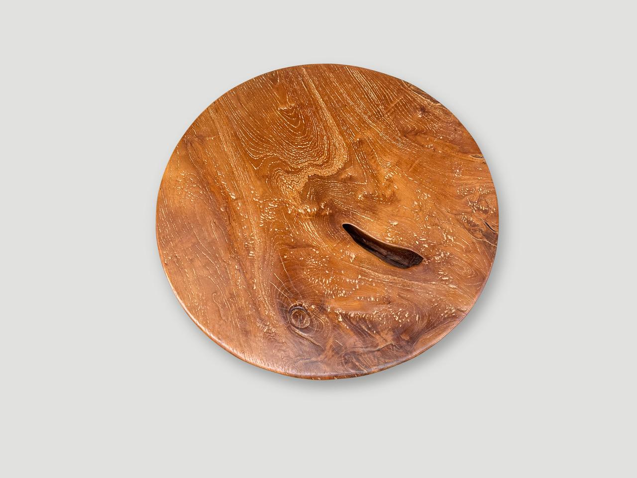 Beautiful century old teak wood from my private collection has been hand carved into this one of a kind minimalist low profile coffee table or side/tray table. The entire piece is carved from one piece of teak with a stunning deep bevel. Finished
