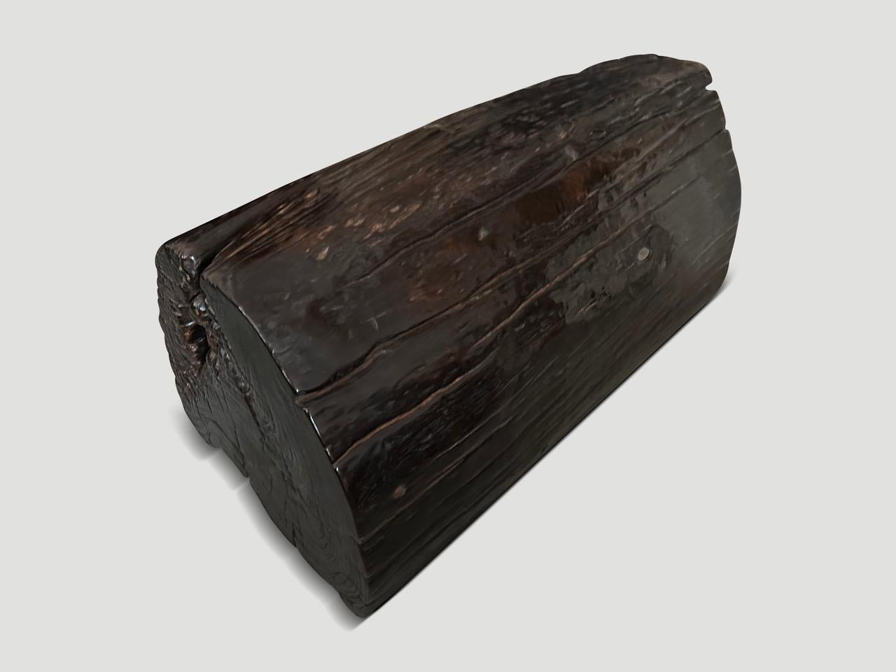 Impressive hollowed out teak wood bench or pedestal. Beautiful unique erosion detail on this one hundred year old wood. We have a pair cut from the same log. The images and price reflect one. As a bench the dimensions are 35 x 18 x 18” high.

Own an
