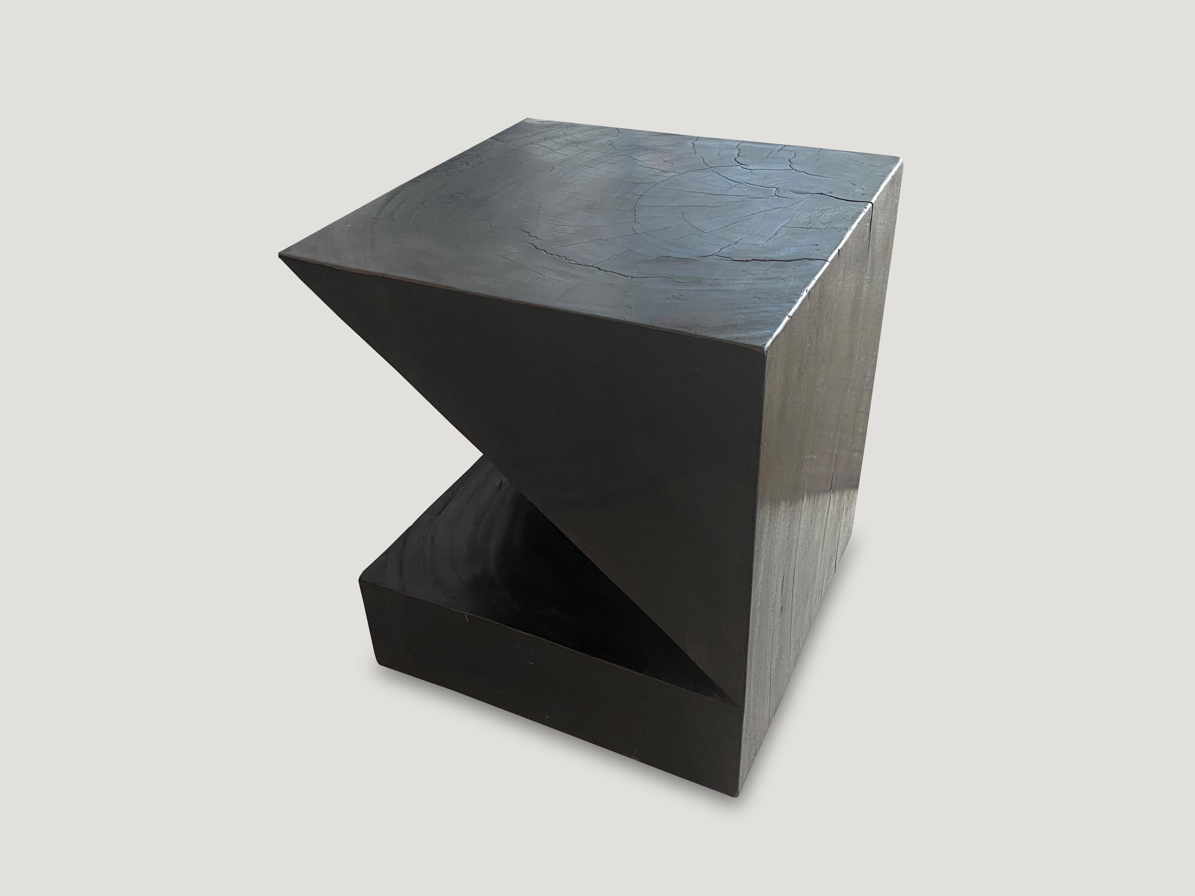 Solid reclaimed suar wood side table. Burnt, sanded and sealed. Inspired by the art of paper folding which is often associated with Japanese culture. New to our collection for 2020. Sold out in this color however we have the natural suar which we