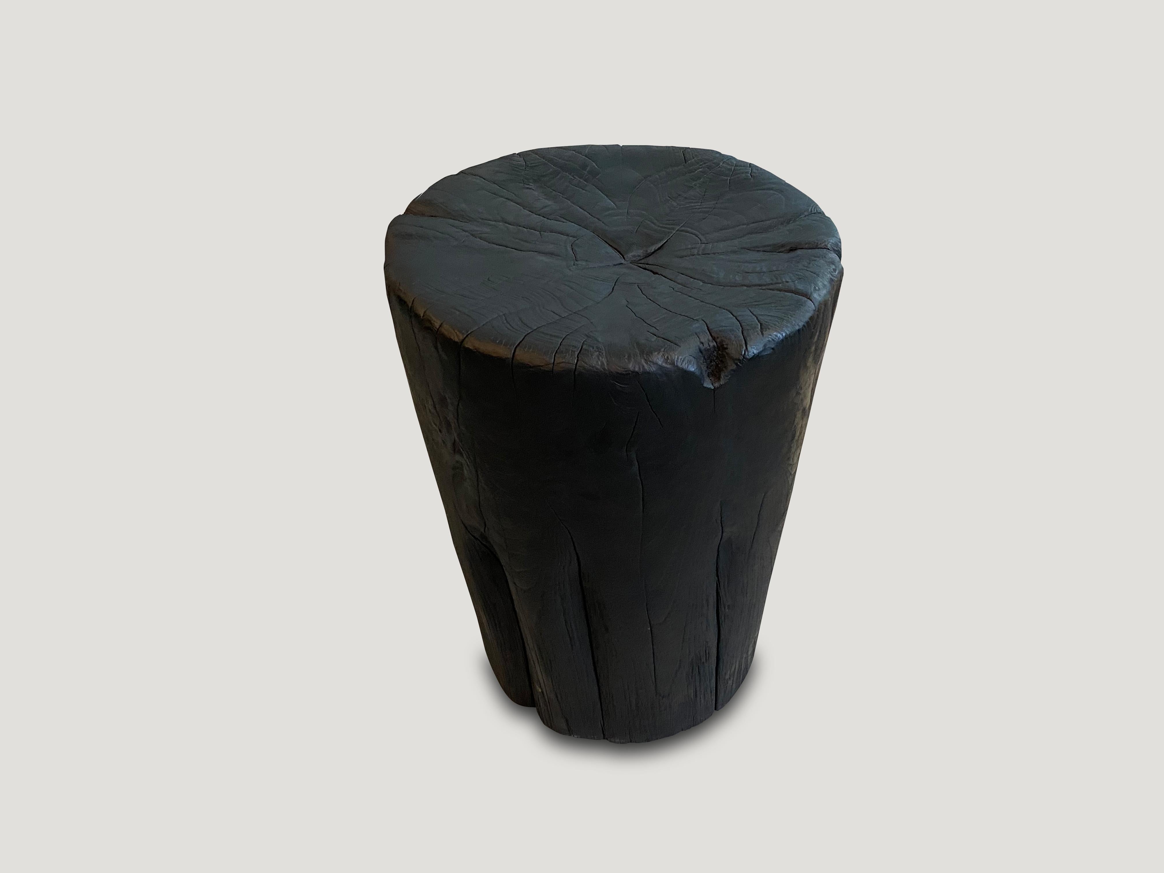 Reclaimed teak wood side table or stool. Hand carved into a drum shape whilst respecting the natural organic wood. Burnt, sanded and sealed. We have a collection. All unique. The price represents the one shown. Also available bleached.

The Triple