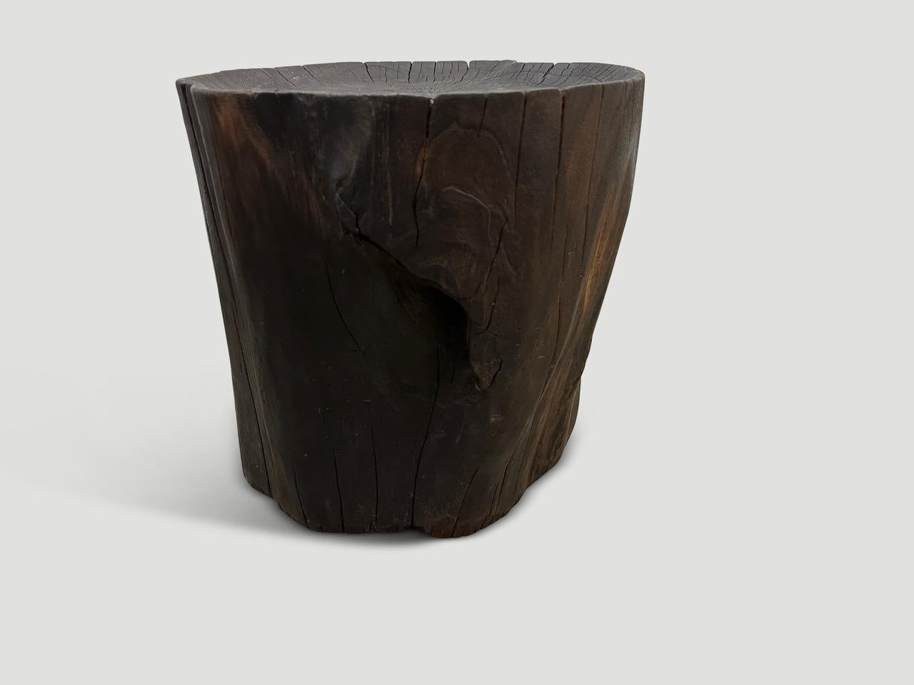 Natural organic formed reclaimed teak root side table. We hand carved the top section into a tray style and lightly charred the aged teak revealing the beautiful wood grain. Both usable and sculptural. We have a collection. All unique. Please