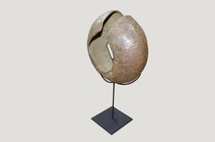 Andrianna Shamaris Copper African Currency on a Modern Stand