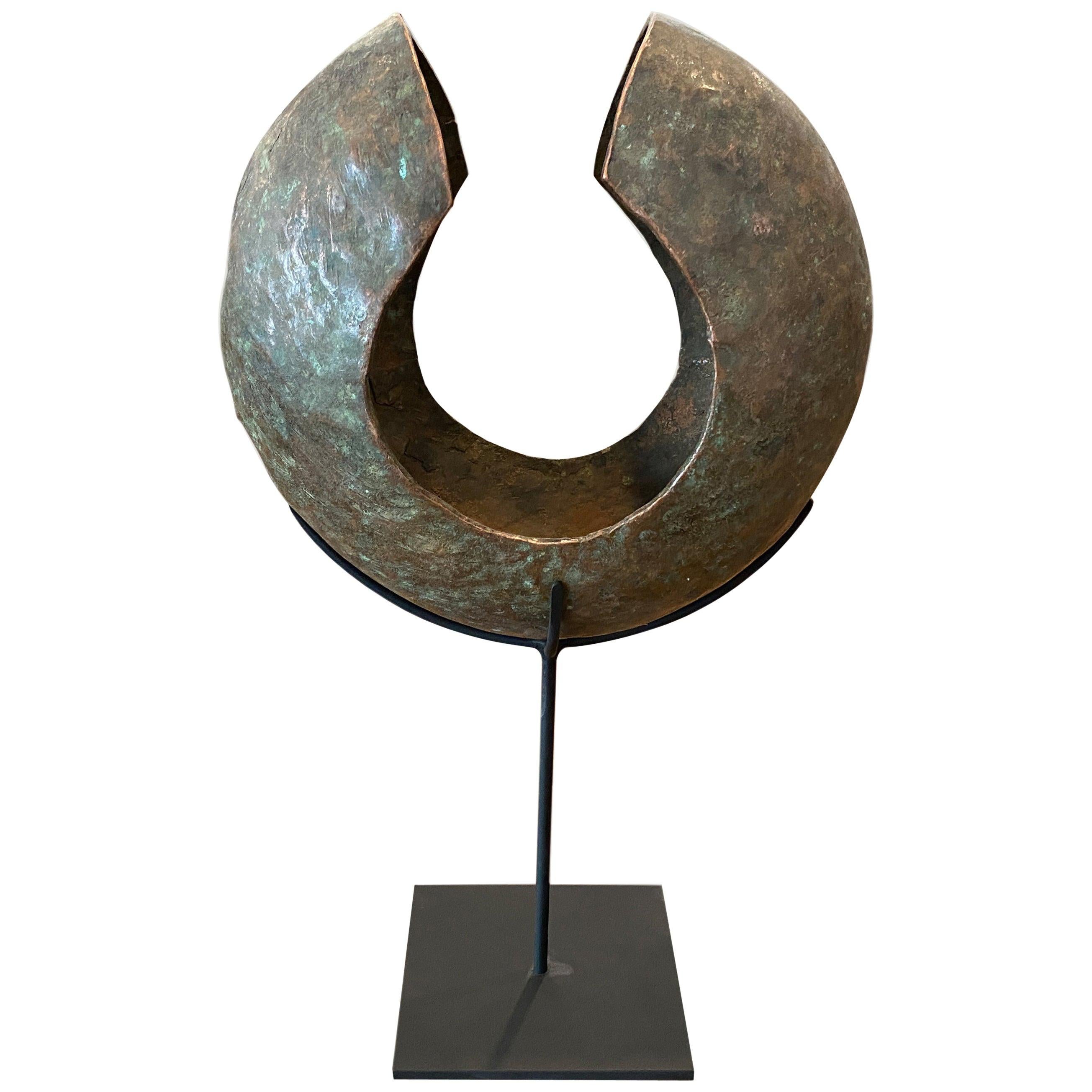 Andrianna Shamaris Copper African Currency on a Modern Stand For Sale