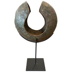 Andrianna Shamaris Copper African Currency on a Modern Stand