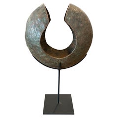 Andrianna Shamaris Copper African Currency on a Modern Stand