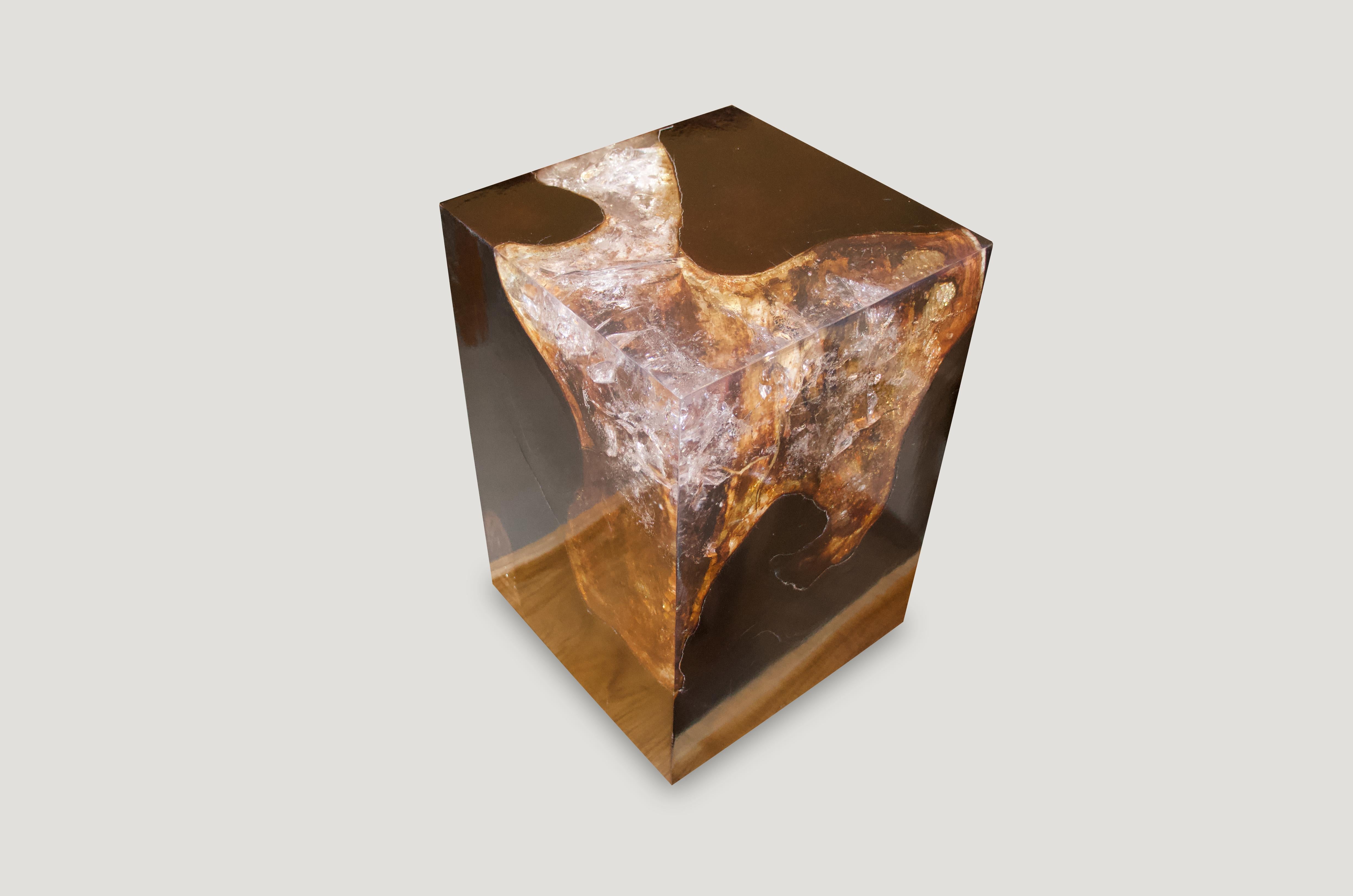 The cracked resin side table is made from teak infused with resin. A dramatic piece due to the depth of the resin, which resembles a unique quartz crystal with many different facets. An impressive addition to any space.

The cracked Resin