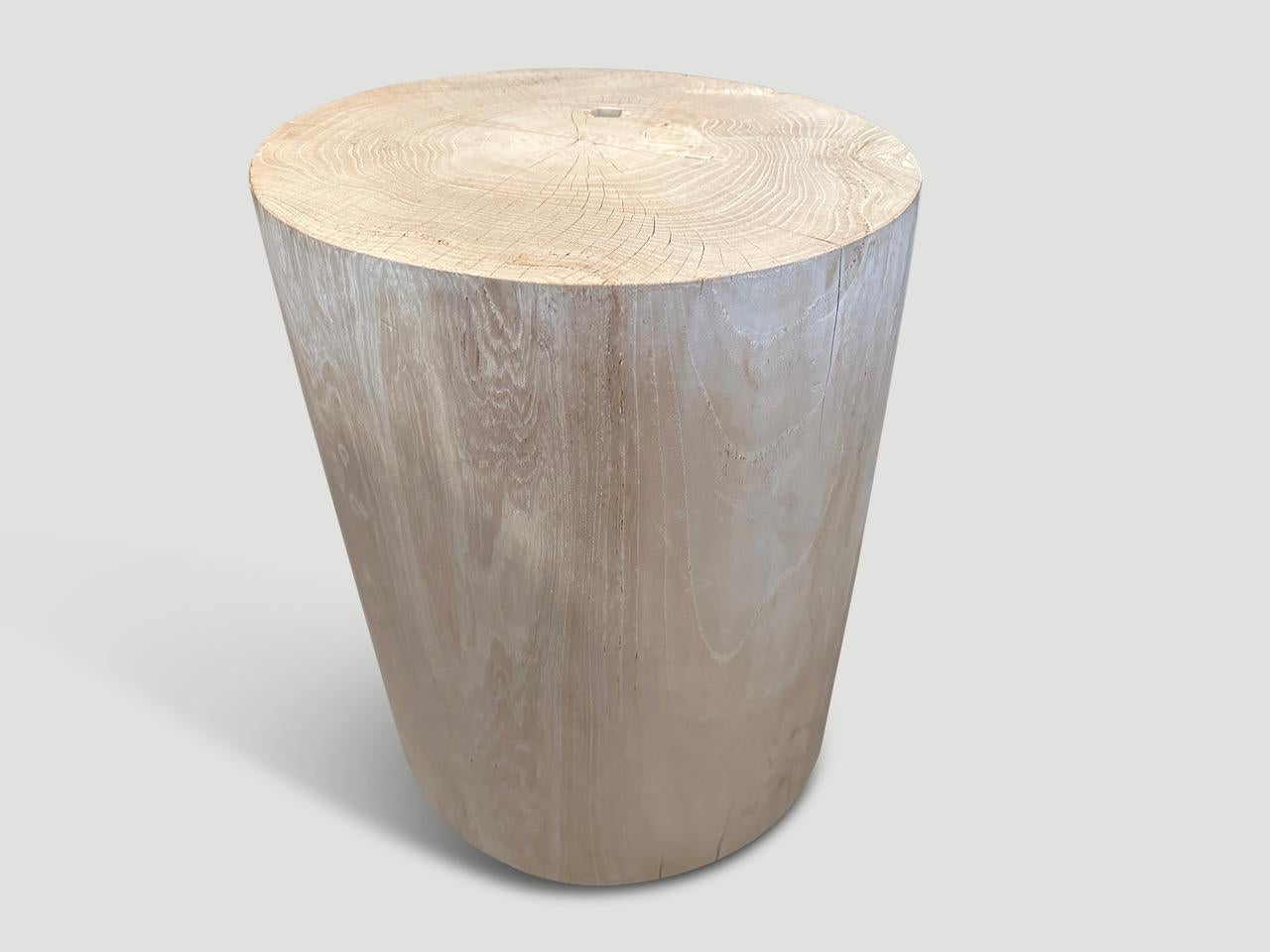 Beautiful reclaimed teak wood cylinder side table or stool. Bleached to a bone finish and carved into a minimalist cylinder whilst respecting the natural organic wood. Also available charred. We have a collection. The images reflect one.

The St.