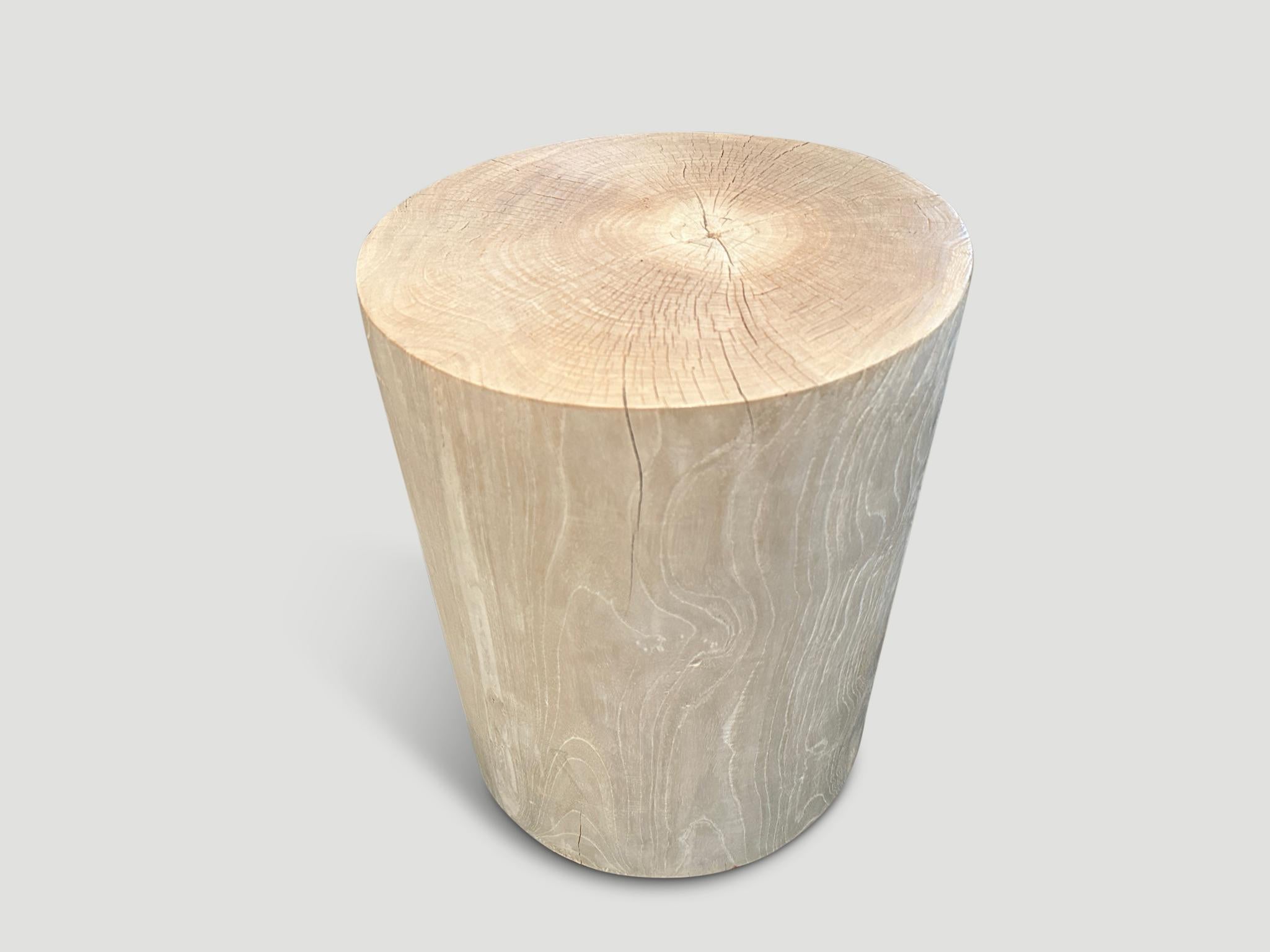 Reclaimed teak wood side table or stool. Bleached and carved into a minimalist cylinder whilst respecting the natural organic wood. Also available charred. We have a collection. Please inquire. The images reflect one.

The St. Barts Collection