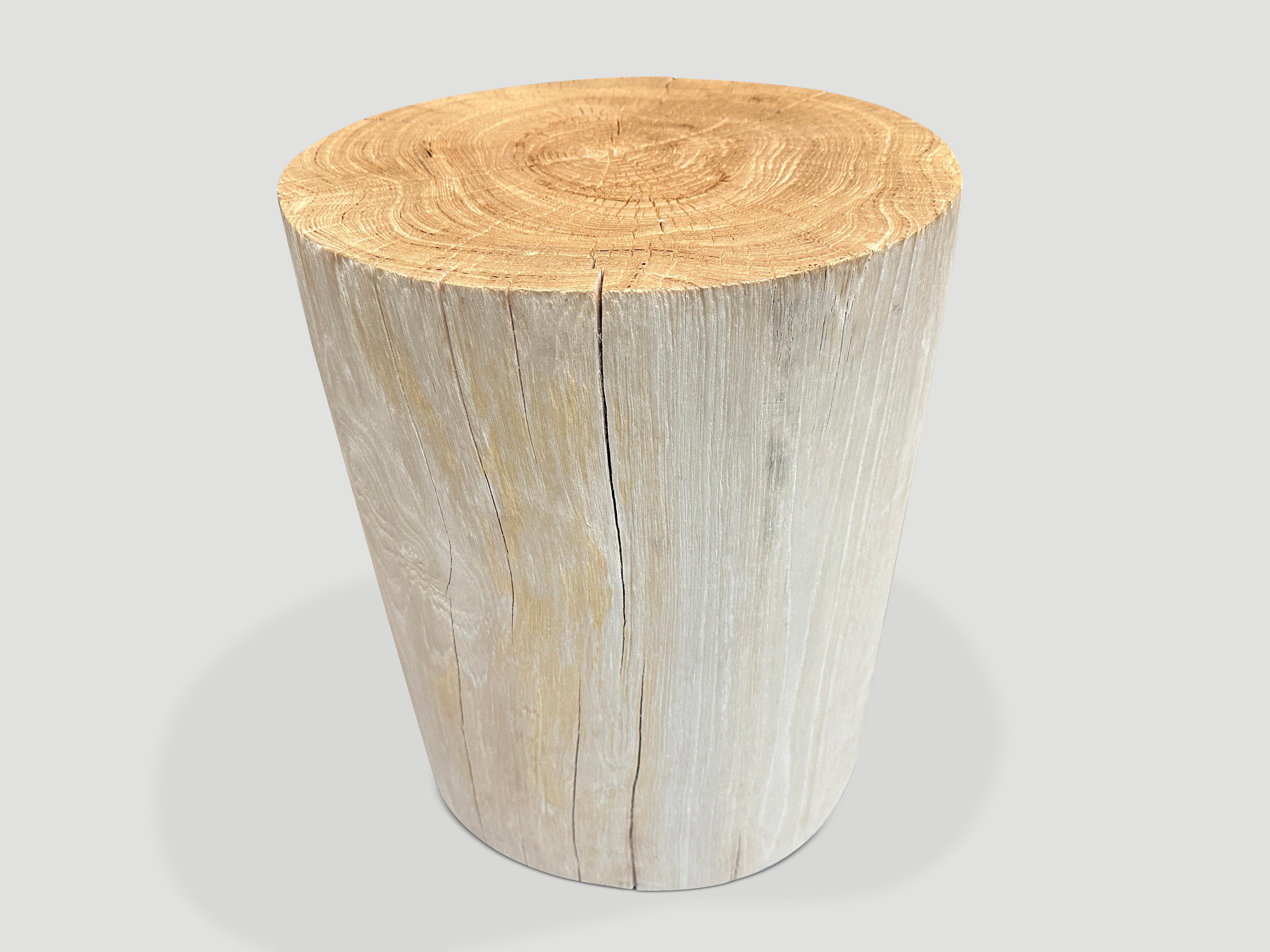 Reclaimed teak wood side table or stool. Bleached and carved into a minimalist cylinder whilst respecting the natural organic wood. Also available charred. We have a collection. Please inquire. The images reflect the one shown.

The St. Barts