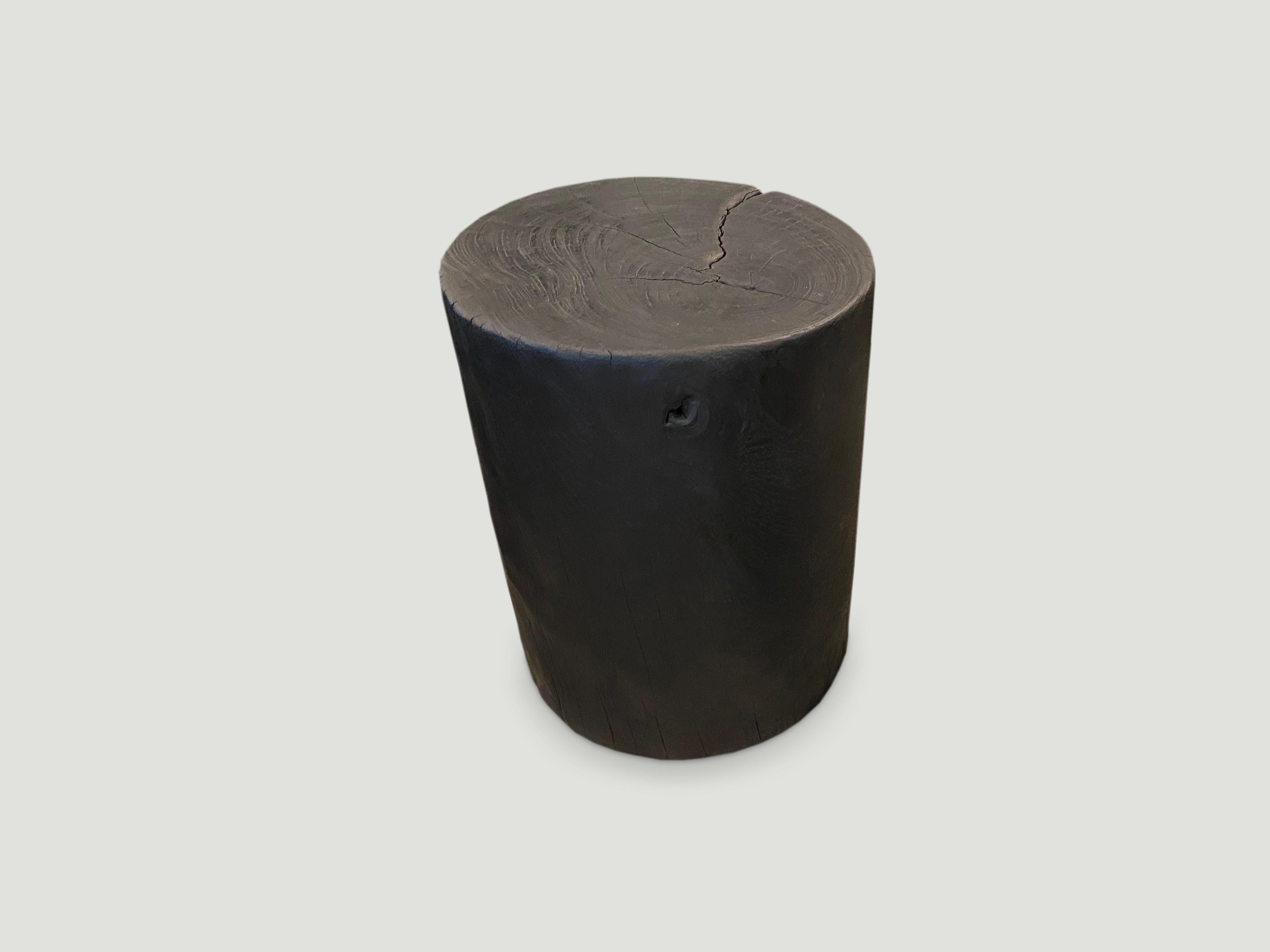 Reclaimed teak wood cylinder side table or stool. Burnt, sanded and sealed and carved into a minimalist cylinder whilst respecting the natural organic wood. We have a collection. All unique. The price represents one. Also available bleached