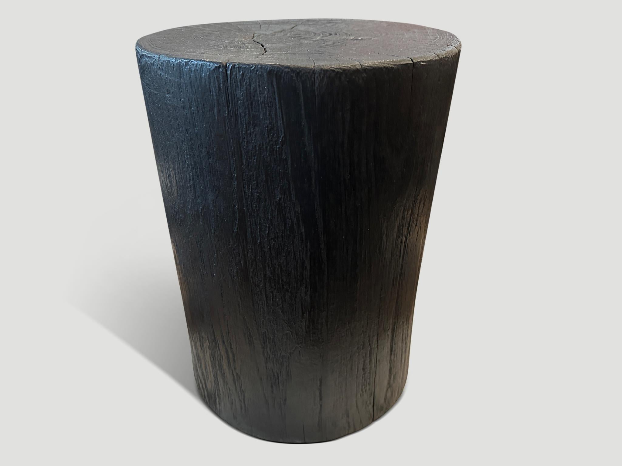 Reclaimed teak wood cylinder side table or stool. Charred sanded and sealed and carved into a minimalist cylinder whilst respecting the natural organic wood. We have a collection. The price and images reflect the one shown. Also available bleached.