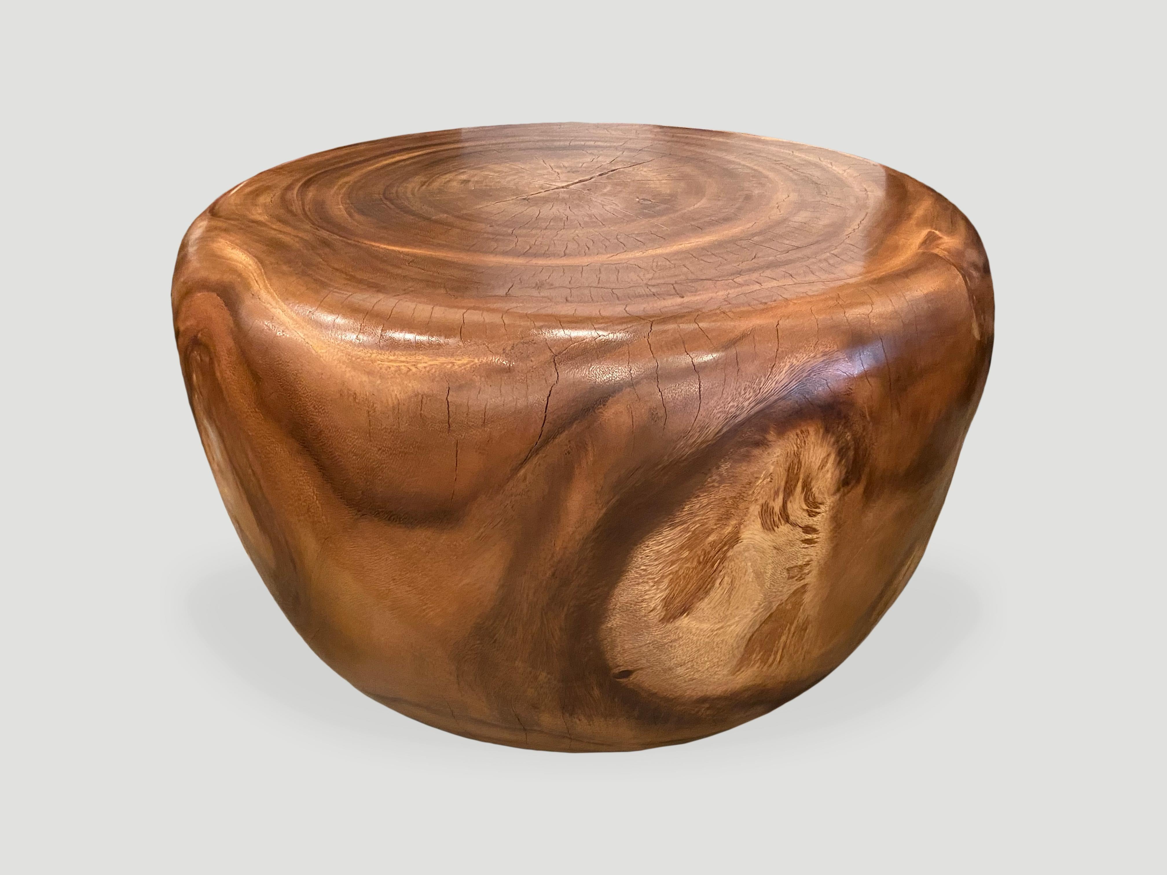 Beautiful wood grain on this reclaimed suar wood coffee table. Hand carved into an impressive drum shape. Natural oil finish. 

Own an Andrianna Shamaris original.

Andrianna Shamaris. The Leader In Modern Organic Design.