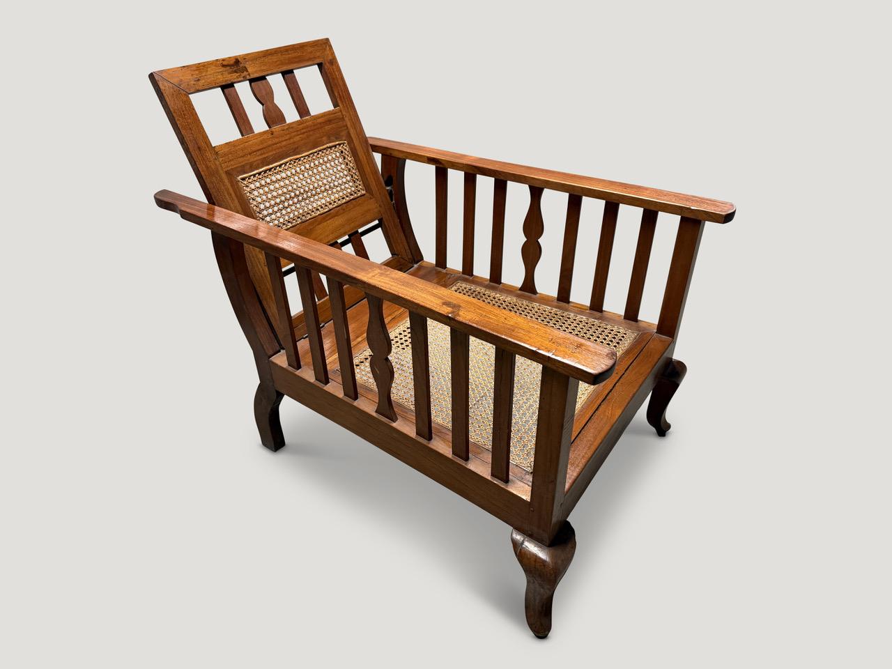 Beautiful Dutch colonial teak chair with adjustable back rest. Pair available. The price reflects one. Circa 1950. Full dimensions; Backrest 22″ high x 11.5” seat height x 38” arm rest deep x 24” wide arm to arm x 27” deep seat.

Andrianna Shamaris.