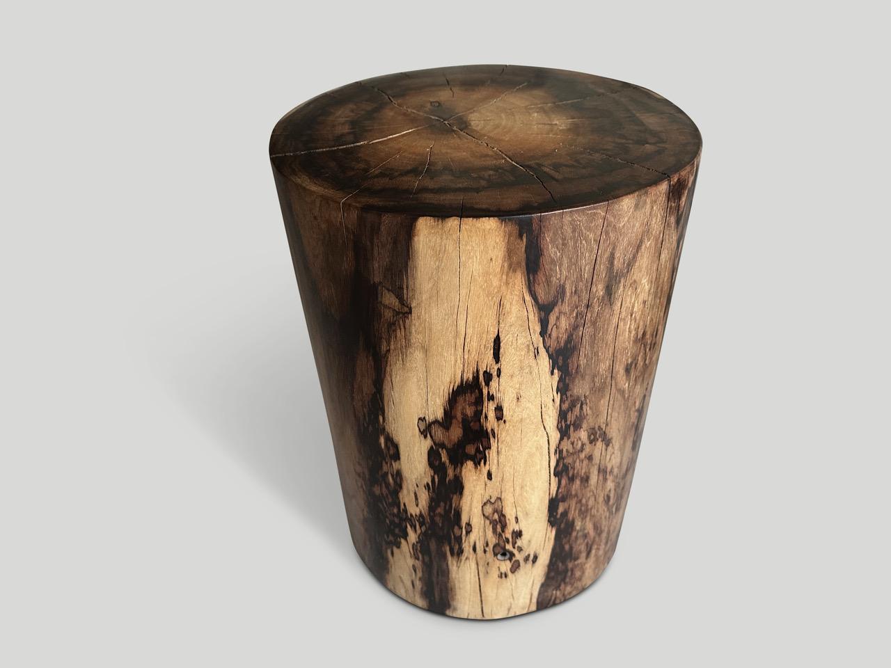 Exquisite rosewood side table or stool with stunning contrasting tones. Finished with a natural oil revealing the beautiful wood grain. We have a collection. The price and images reflect the one shown. 

Own an Andrianna Shamaris