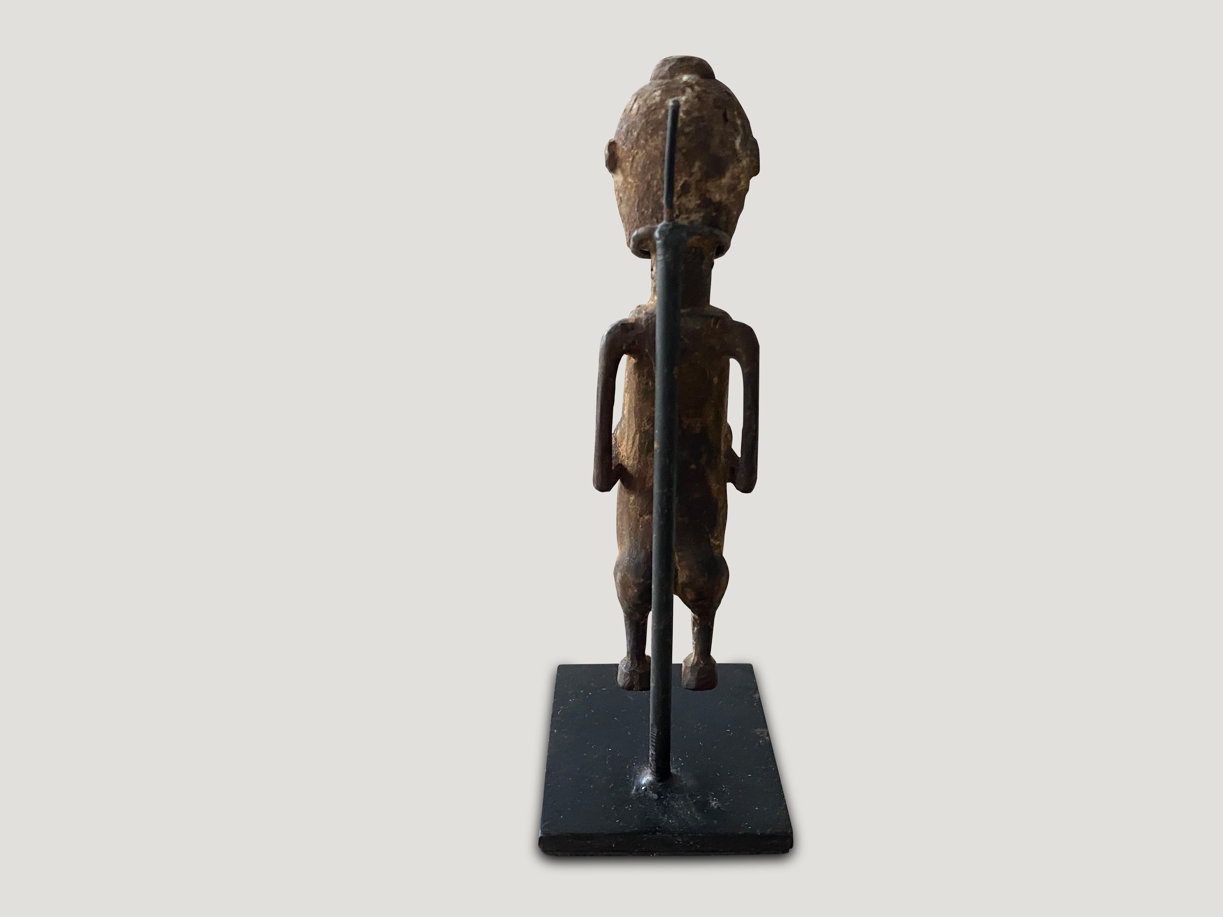 intricate wooden figurine