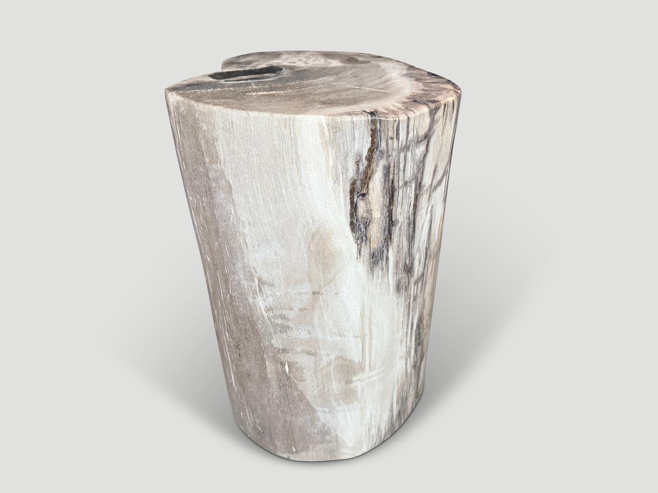 Impressive beautiful tones on this high quality super smooth petrified wood side table. It’s fascinating how Mother Nature produces these stunning 40 million year old petrified teak logs with such contrasting colors and natural patterns throughout.