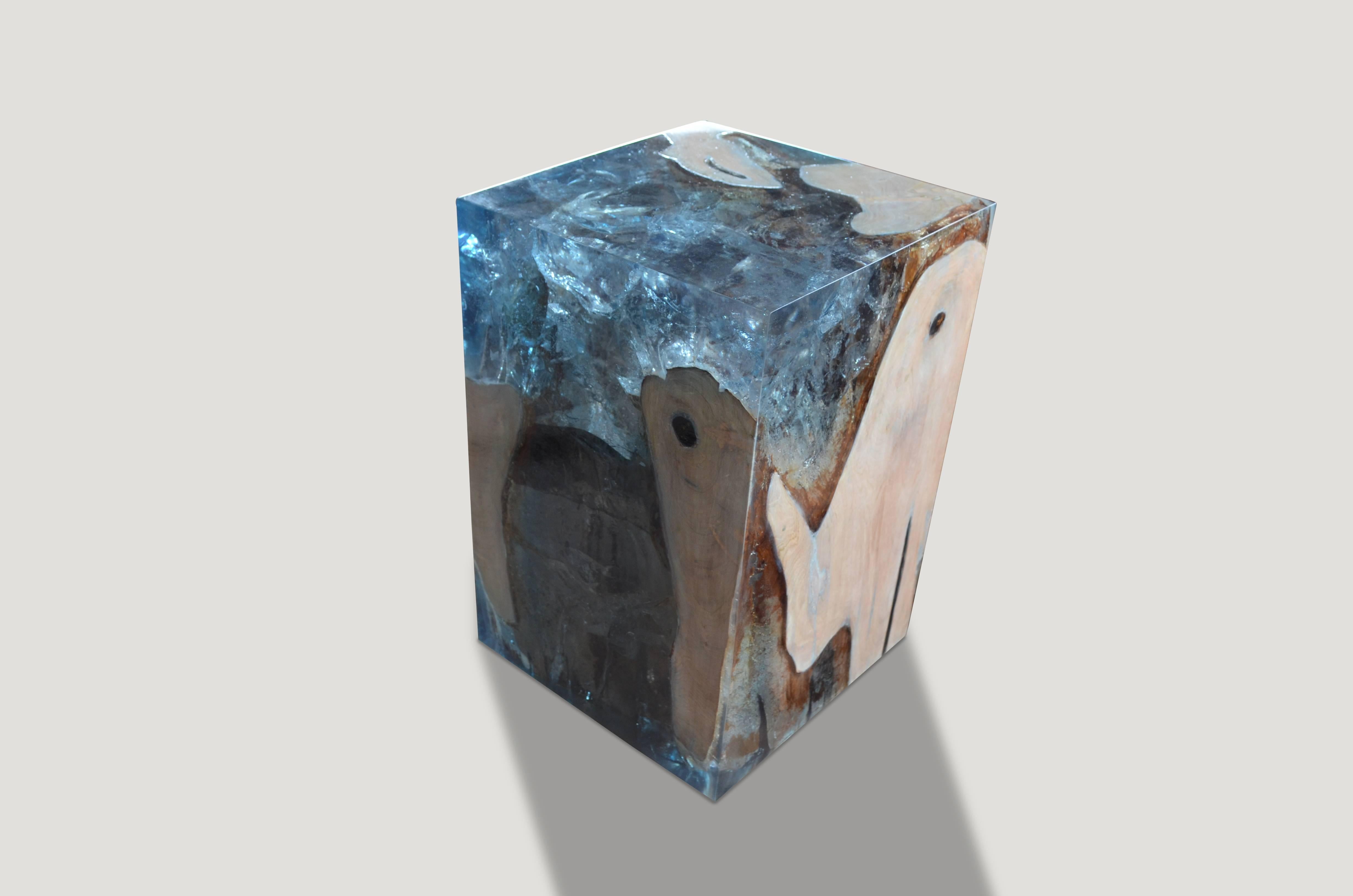 The St. Barts side table is a unique variation of the teak and cracked resin cube. Ice blue or aqua resin is cracked and added into the natural grooves of the bleached teak wood, sanded and finished with a high polish.

The St. Barts Collection