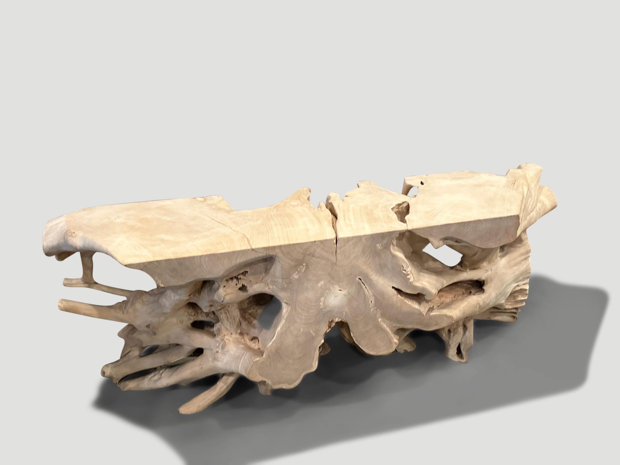 Impressive natural organic formed console table made from a hundred year old reclaimed teak root. Fabulous on both sides. Glass or lucite can be added, if preferred on the top section. Finished with a light white wash revealing the beautiful wood