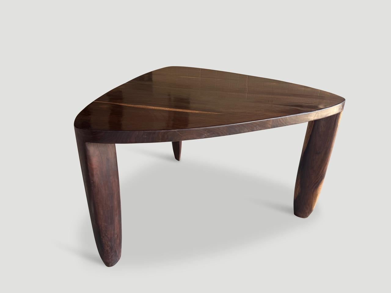 Rare ancient rosewood from my private collection is hand made into a one of a kind table. Perfect as an entrance table, game table or a dining table. We can reduce the height on the legs if required. The top is two inches thick and supported by