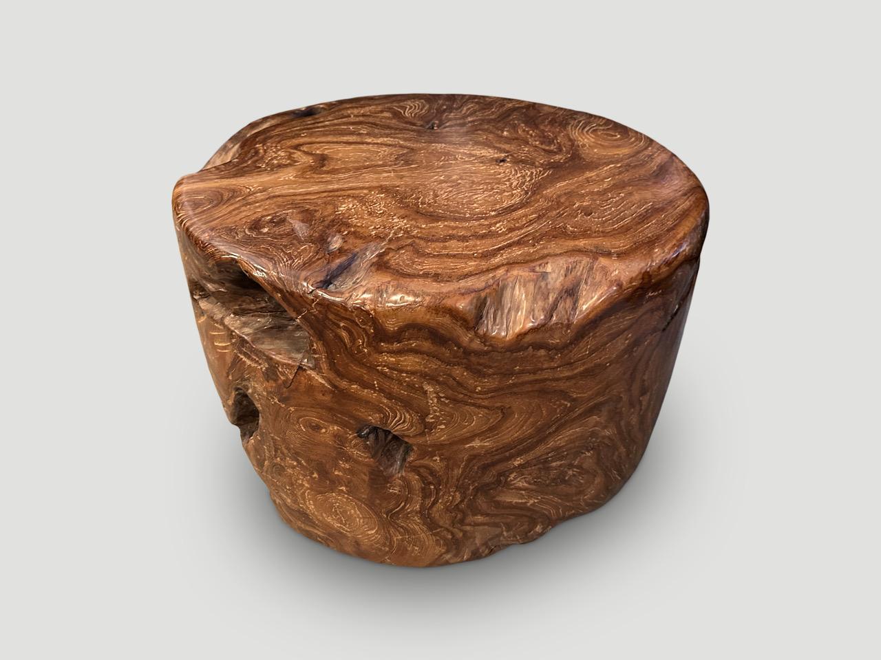 Century old solid teak wood coffee table or side table. Taken from my finest collection and hand shaped into this stunning piece of art. Both usable and sculptural. We added a natural oil revealing the beautiful wood grain. It’s all in the