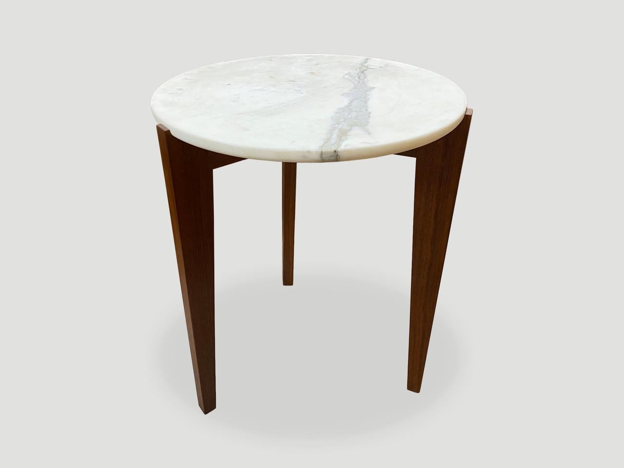 Minimalist one inch thick Italian marble top rests on solid walnut legs. From the Made in New York Collection. 

Own an Andrianna Shamaris original.

Andrianna Shamaris. The Leader In Modern Organic Design.