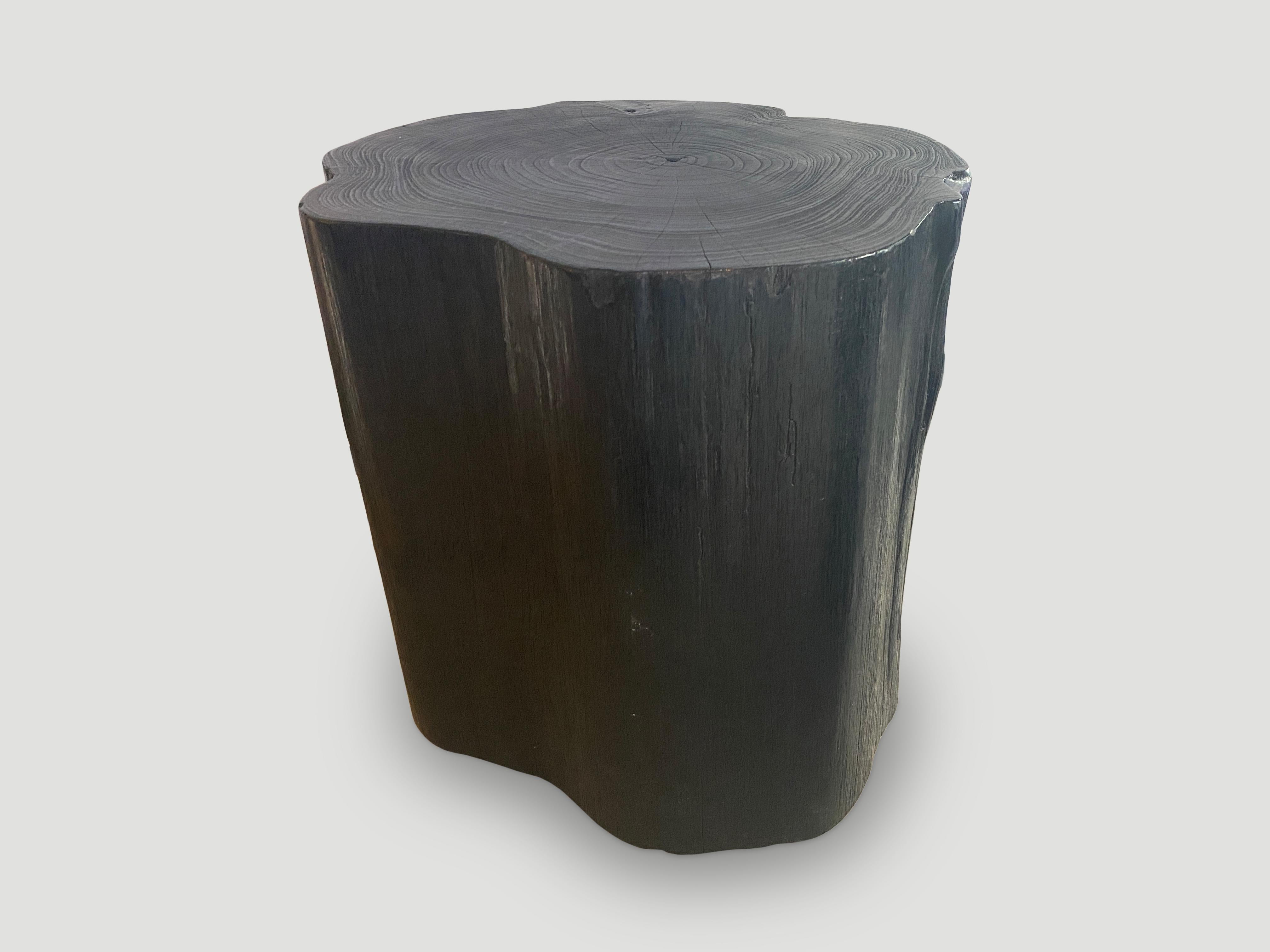 Large scale solid reclaimed teak wood side table. Charred, sanded and sealed revealing the beautiful wood grain. Custom stains and finishes available.

The Triple Burnt Collection represents a unique line of modern furniture made from solid