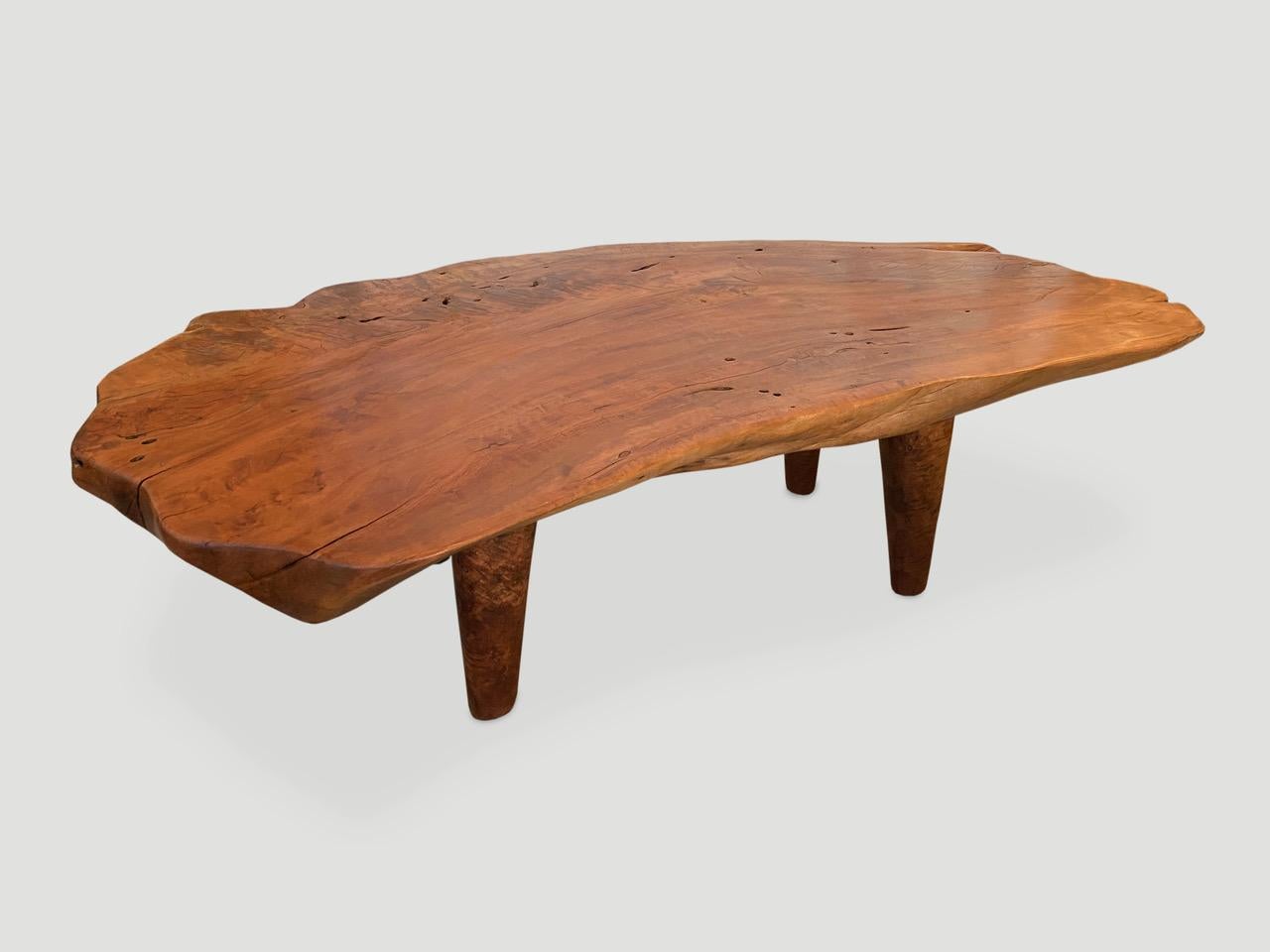 Reclaimed four inch thick lychee wood coffee table with a natural oil finish. Floating on midcentury style legs. Organic with a twist.

Own an Andrianna Shamaris original.

Andrianna Shamaris. The Leader In Modern Organic Design.