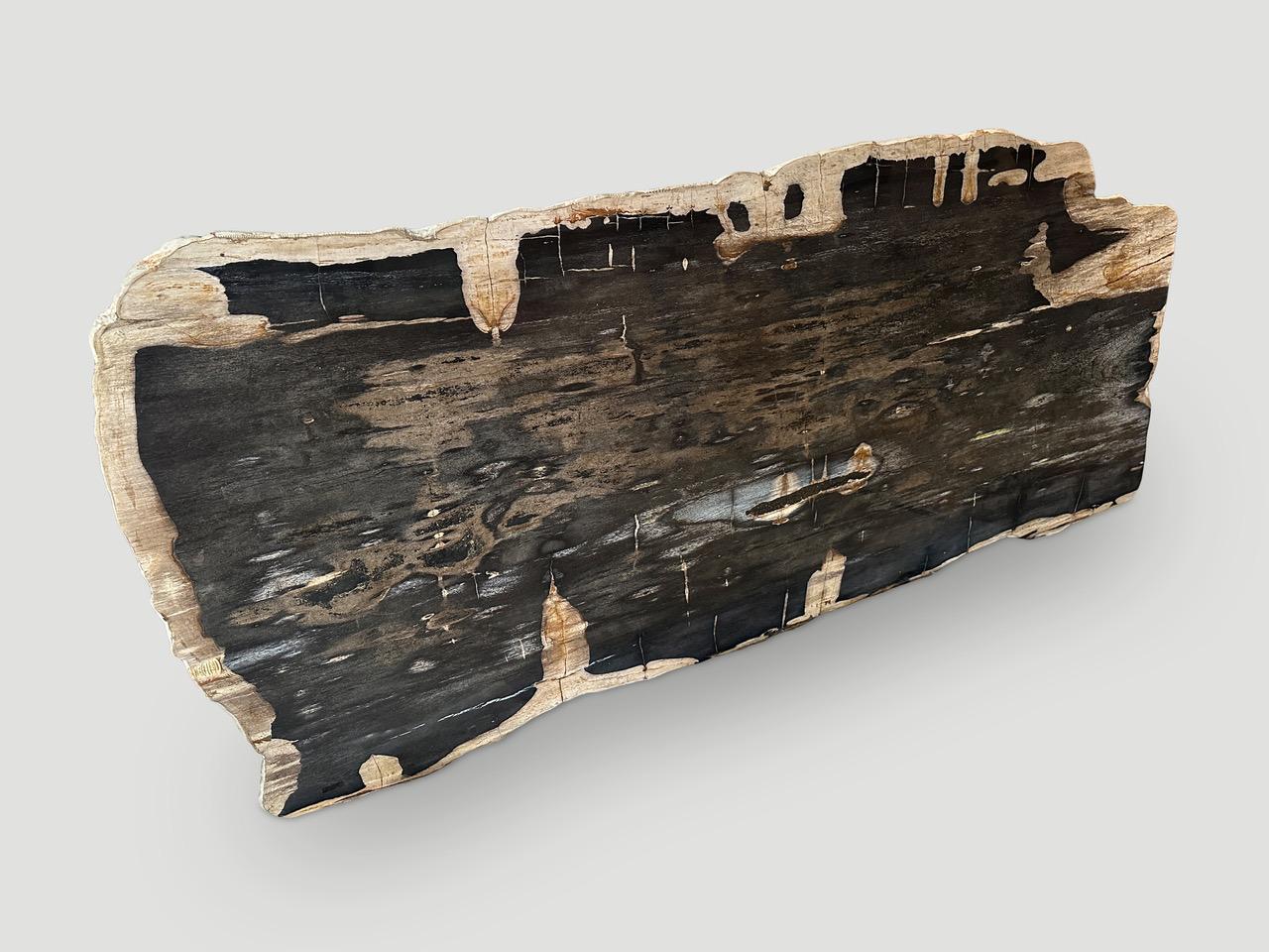 Impressive live edge single slab with stunning natural, contrasting markings. This can be made into a dining table, coffee table or counter top. The live edge is 34