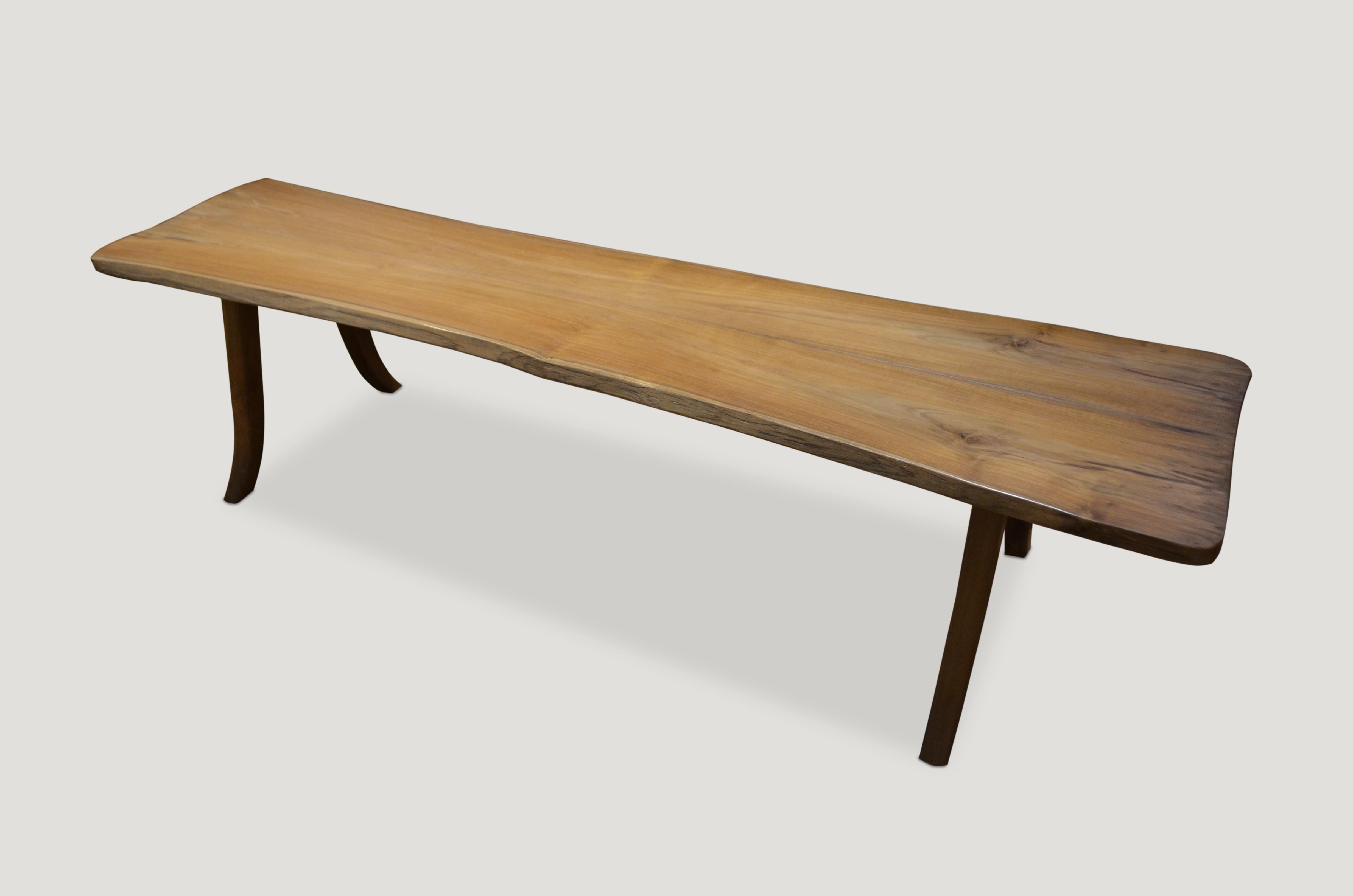 Reclaimed teak bench with a live edge and a natural oil finish. Sliced from the same slab and joined. Perfect for inside or outside living.

Andrianna Shamaris. The Leader In Modern Organic Design™