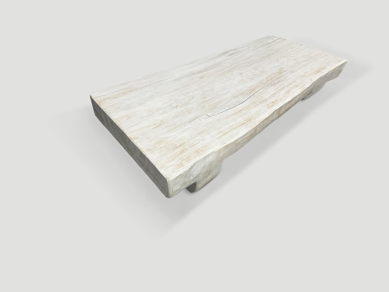 Coffee table hand carved from a single suar wood log. The legs and top are carved from one piece of wood with no joins. Bleached and finished with a light white wash. Full dimensions ; 41” long x 18- 23” wide x 8.5″ high.

The St. Barts Collection