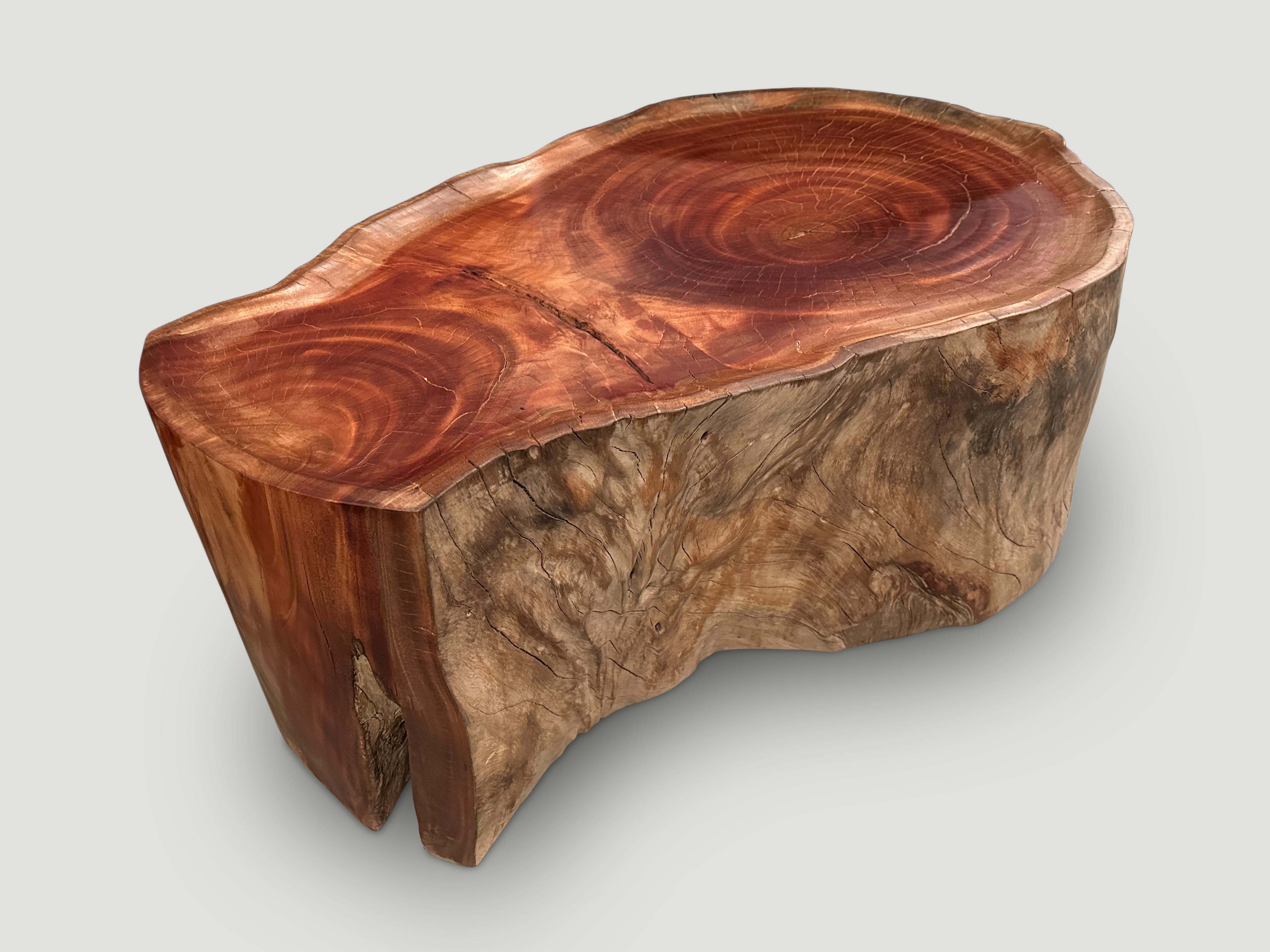 Impressive mahogany wood coffee table hand carved into this usable shape whilst respecting the organic wood. We hand carved the top section into a tray style and polished the aged wood with a natural oil revealing the beautiful wood grain. The sides