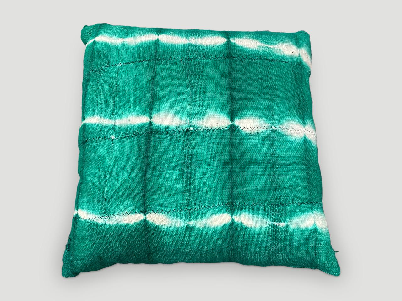 Green over-dyed mud cloth Mali textile from West Africa, made into a pillow. Double backed with concealed zipper. Insert included. We have a collection. The price reflects the one shown.

Andrianna Shamaris. The Leader In Modern Organic Design.