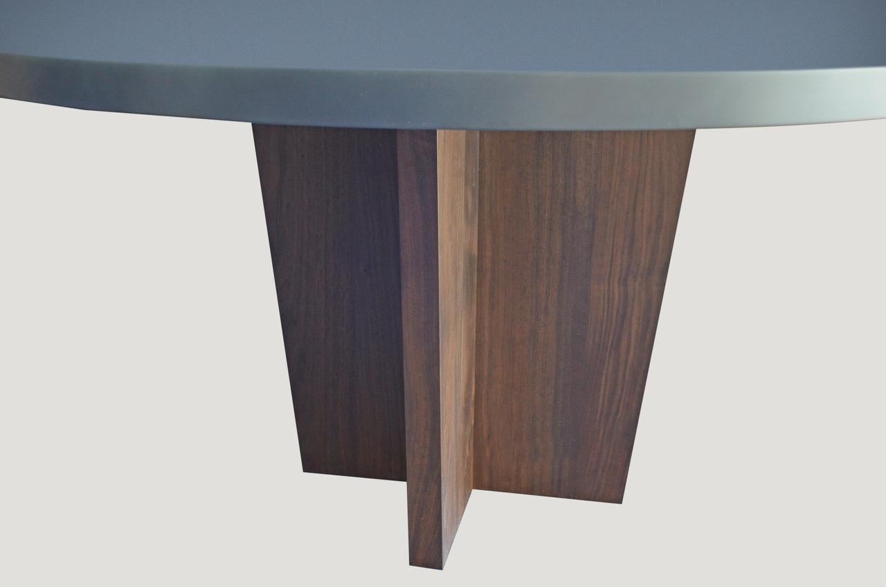 Introducing the Made In New York Collection. The Malibu resin dining table is the first collection made in New York. The table shown has a modern cross black walnut base with a hand made resin coated top.  The top can be matte or polished and can