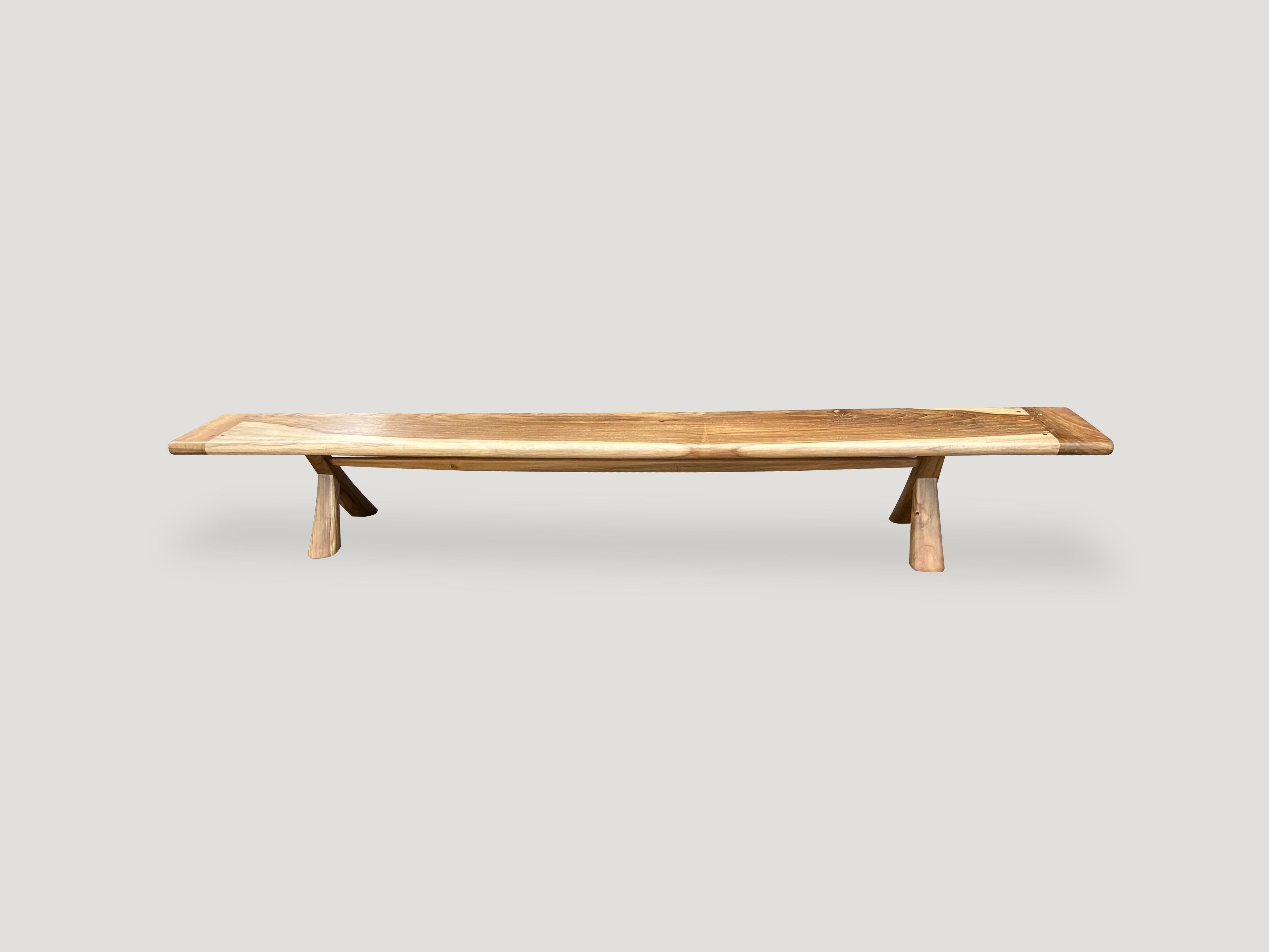 Introducing the midcentury Couture Collection new to 2021. Furniture constructed by hand from start to finish. A long bench made from a single two inch slab of reclaimed teak wood taken from my finest collection, hand carved with smooth rounded