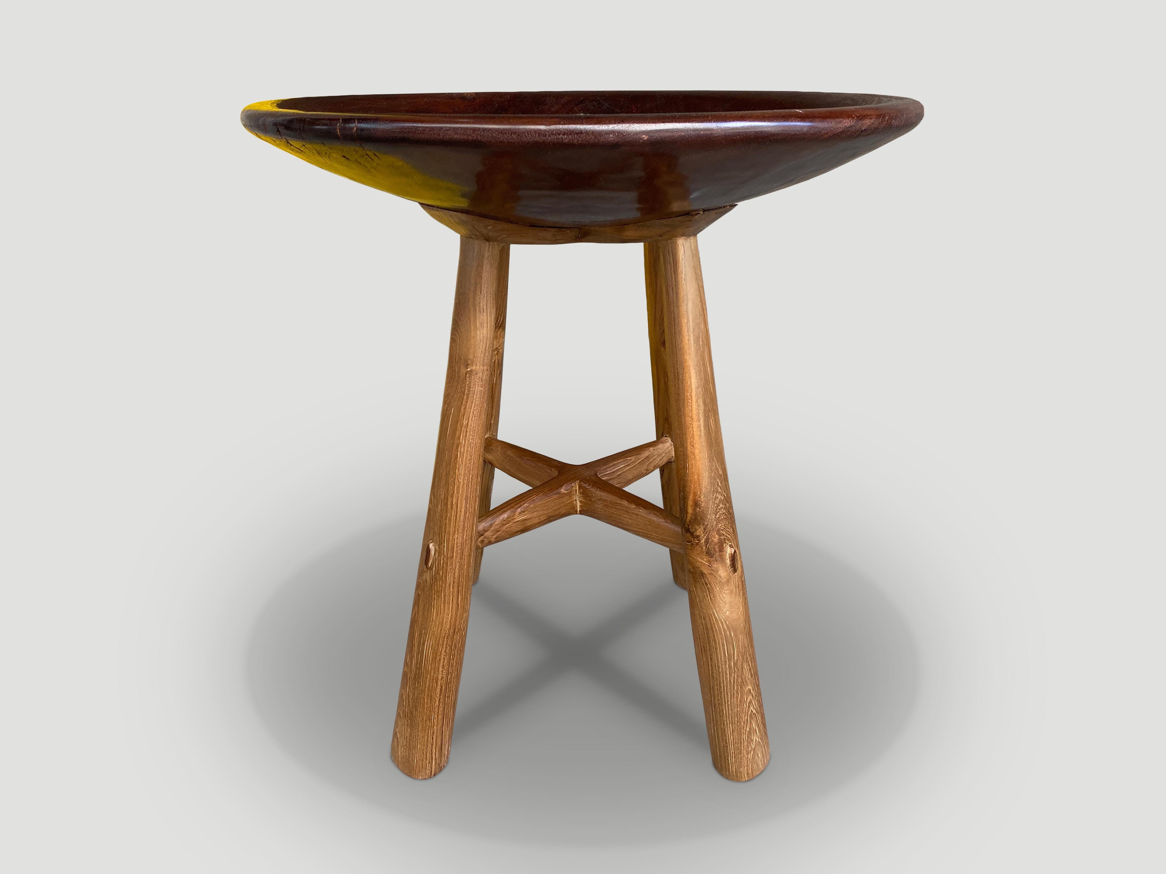 Introducing the mid century Couture Collection. Furniture constructed by hand from start to finish. A beautiful century old Merbau deep wood bowl from Sumatra, is polished with a natural oil revealing the stunning wood grain. We added mid century