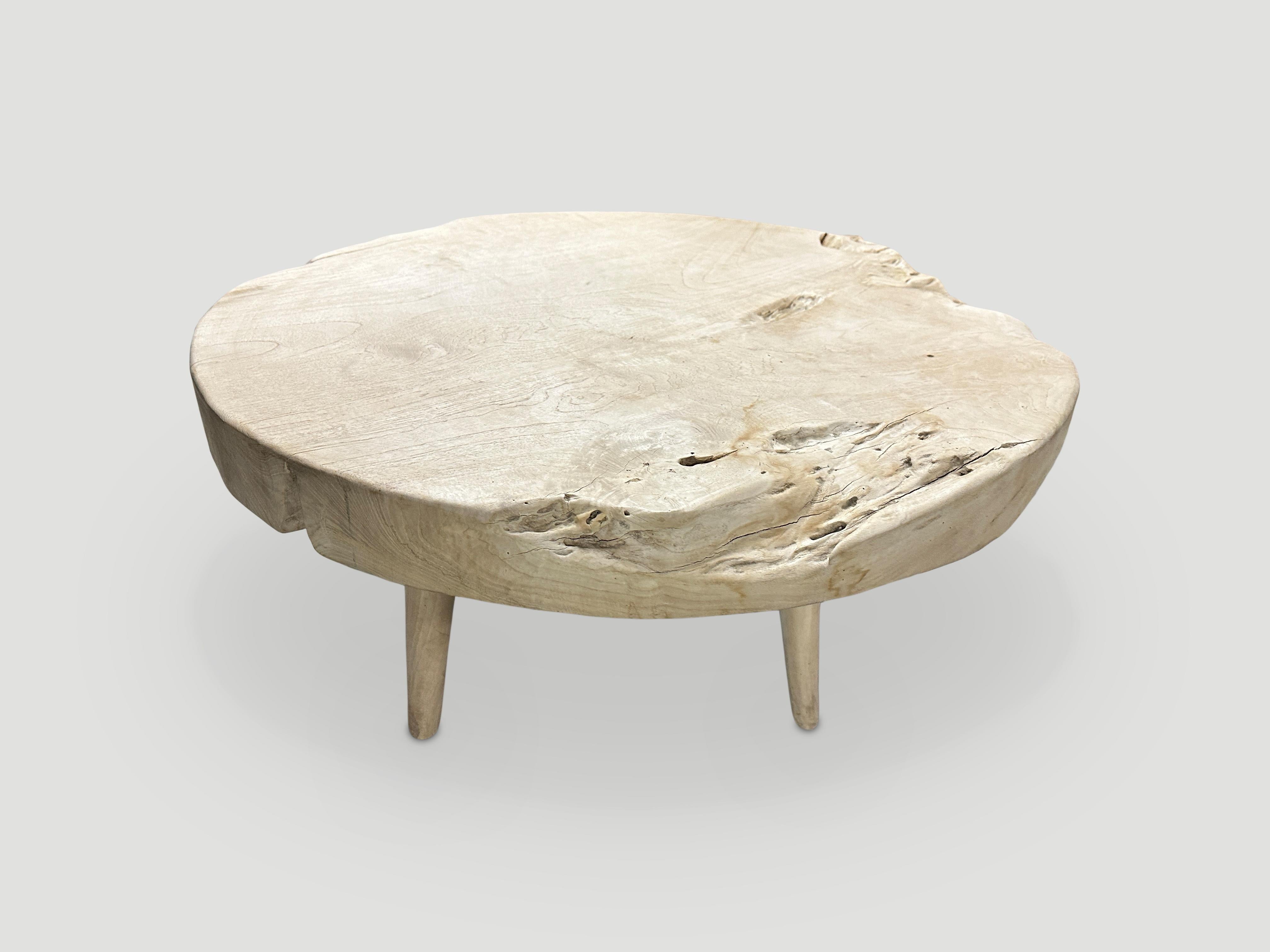 Impressive three inch single slab reclaimed teak wood coffee table. We bleached the teak and added a light white wash revealing the beautiful wood grain. Floating on mid century style legs. Organic with a twist. 

The St. Barts Collection features
