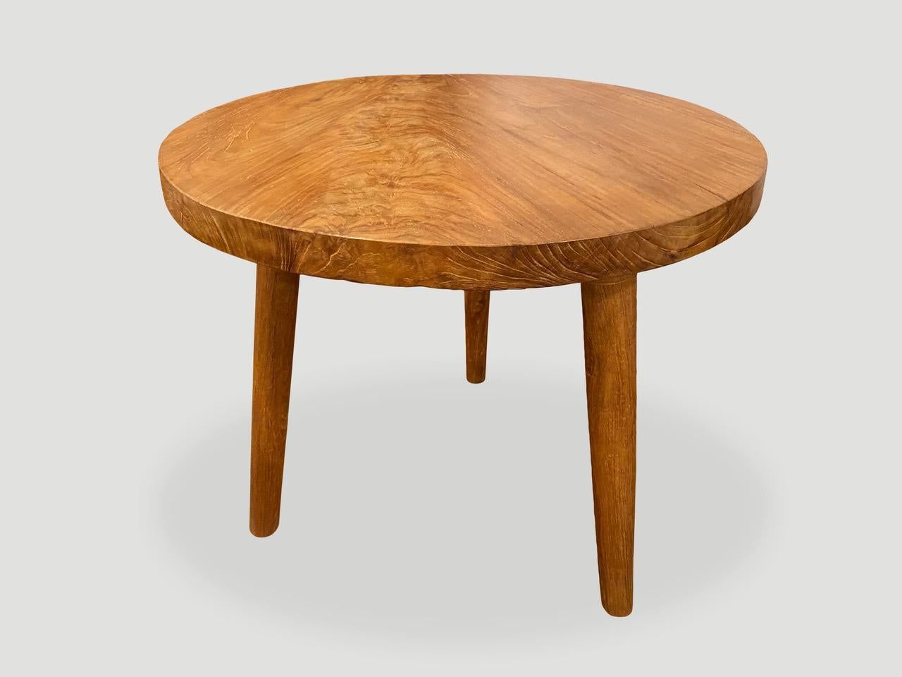 Single slab reclaimed teak wood side table with a natural oil finish revealing the beautiful grain in the wood. Floating on mid century style legs.

Own an Andrianna Shamaris original.

Andrianna Shamaris. The Leader In Modern Organic Design.