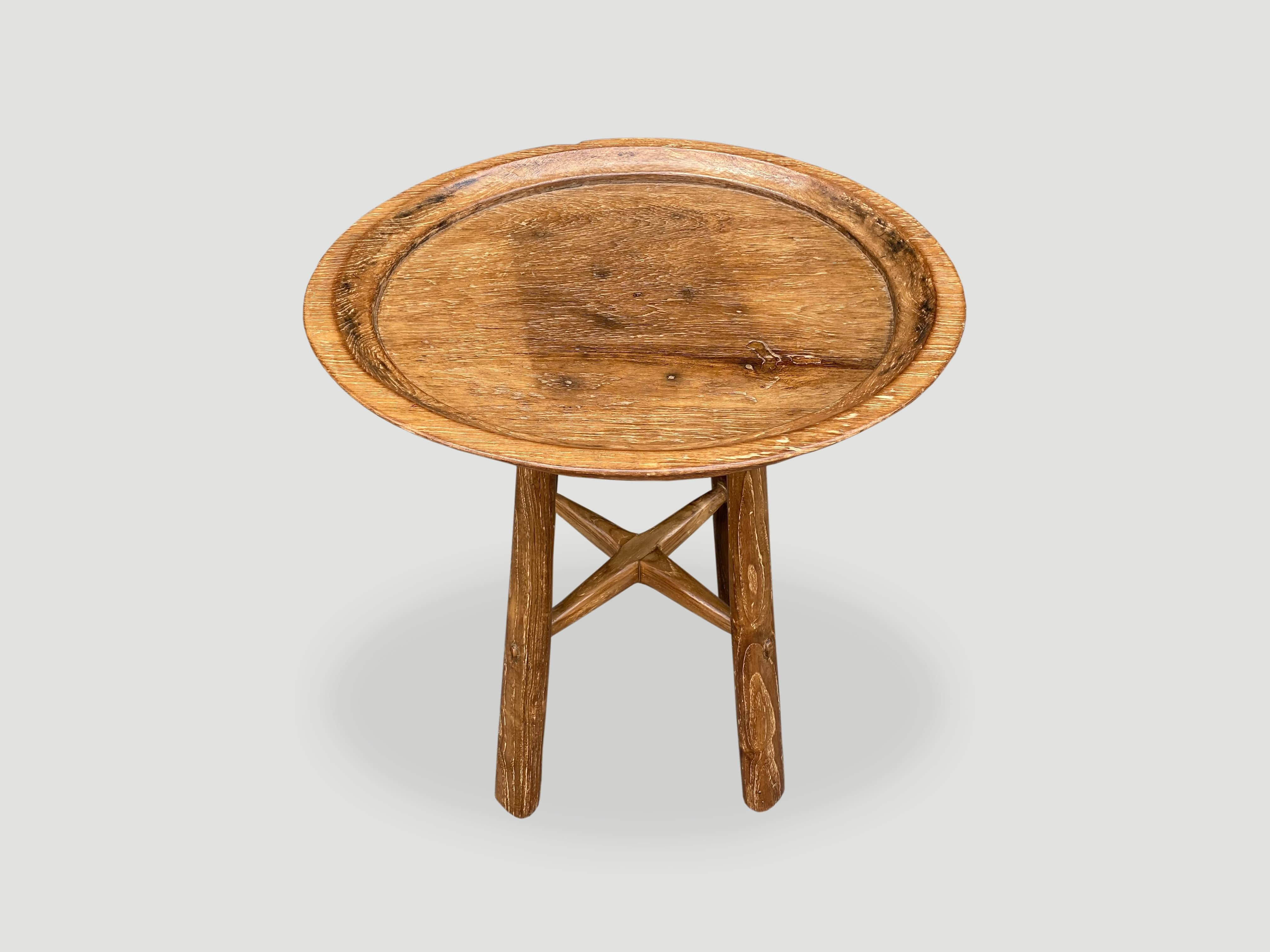 Introducing the midcentury Couture collection new to 2021. Taken from my finest collection, a beautiful antique wabi sabi wood tray. We added midcentury style rounded teak legs for a beautiful tray side table.

Own an Andrianna Shamaris