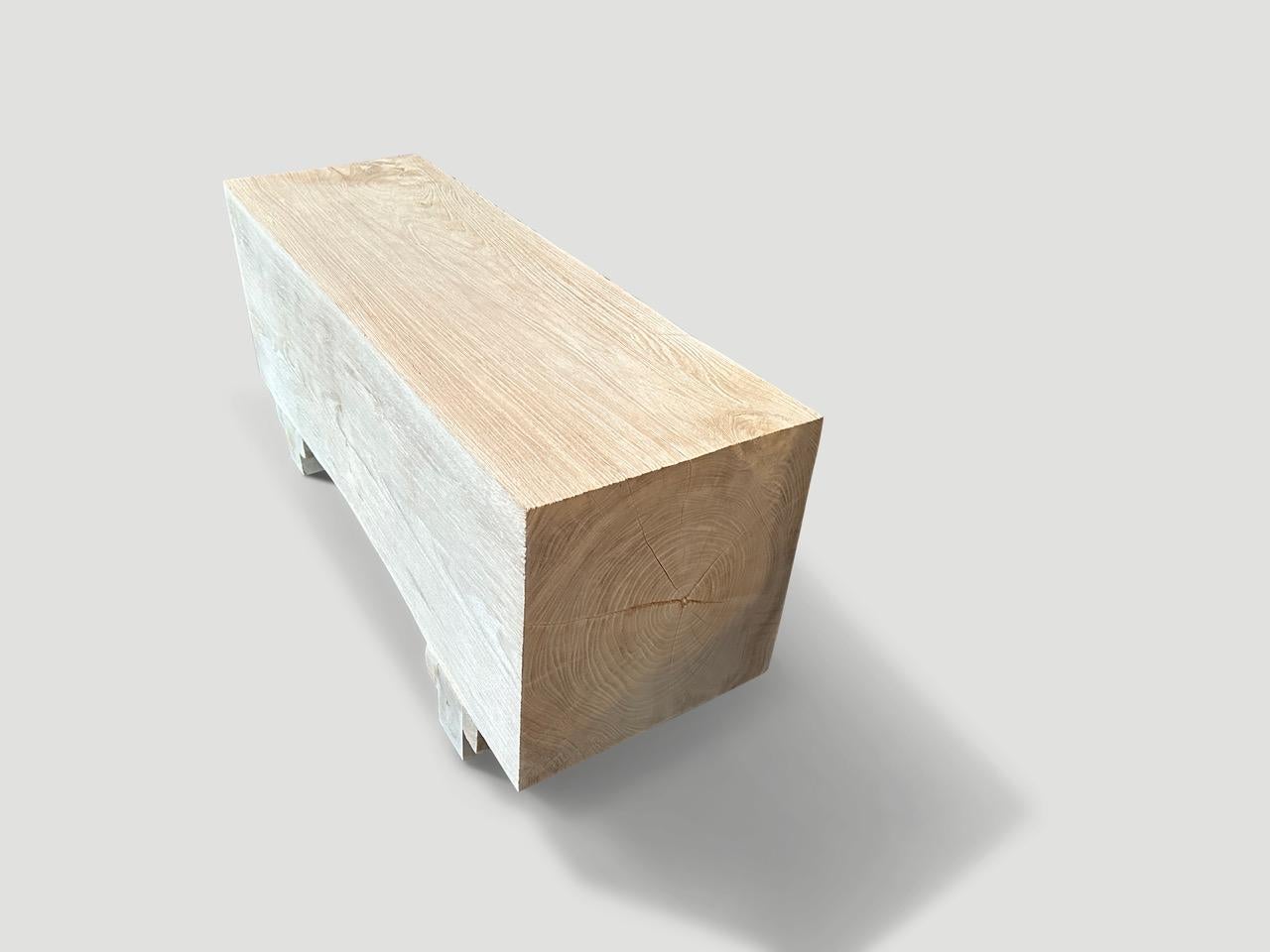Reclaimed teak wood log bench floating 5.5” off the floor. Bleached to a bone finish and with an iron brush revealing the beautiful wood grain. It’s all in the details. Pair available. The price reflects the one shown.

The St. Barts Collection