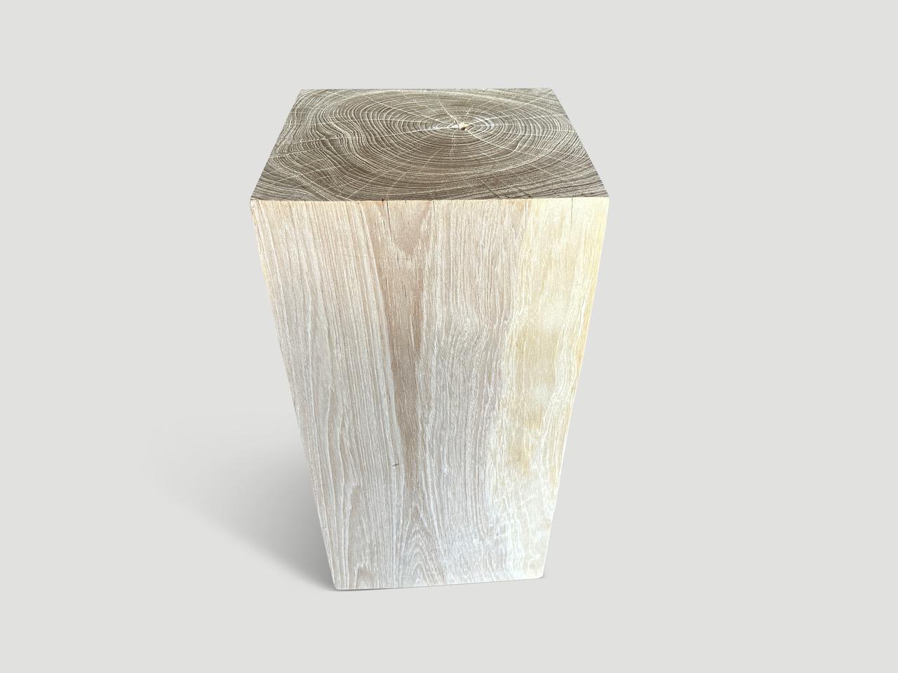 Reclaimed teak wood side table or pedestal hand carved whilst respecting the natural organic wood. Bleached to a bone finish revealing the beautiful wood grain. We have a collection of four. The price reflects one.

The St. Barts Collection features