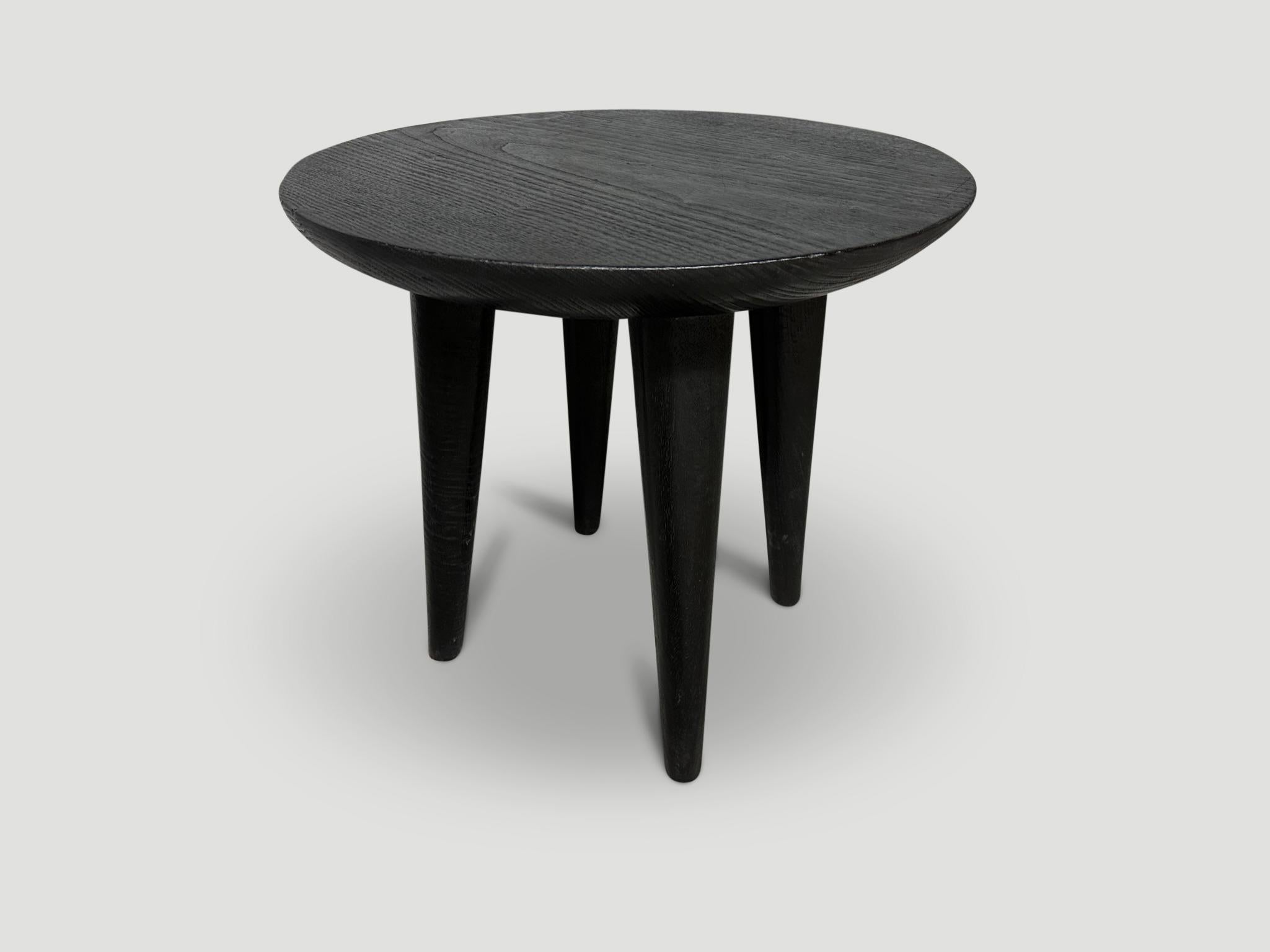 Minimalist side table with a three inch single slab, bevelled top resting on cone style legs. Charred, sanded and sealed revealing the beautiful wood grain. It’s all in the details.

The Triple Burnt Collection represents a unique line of modern